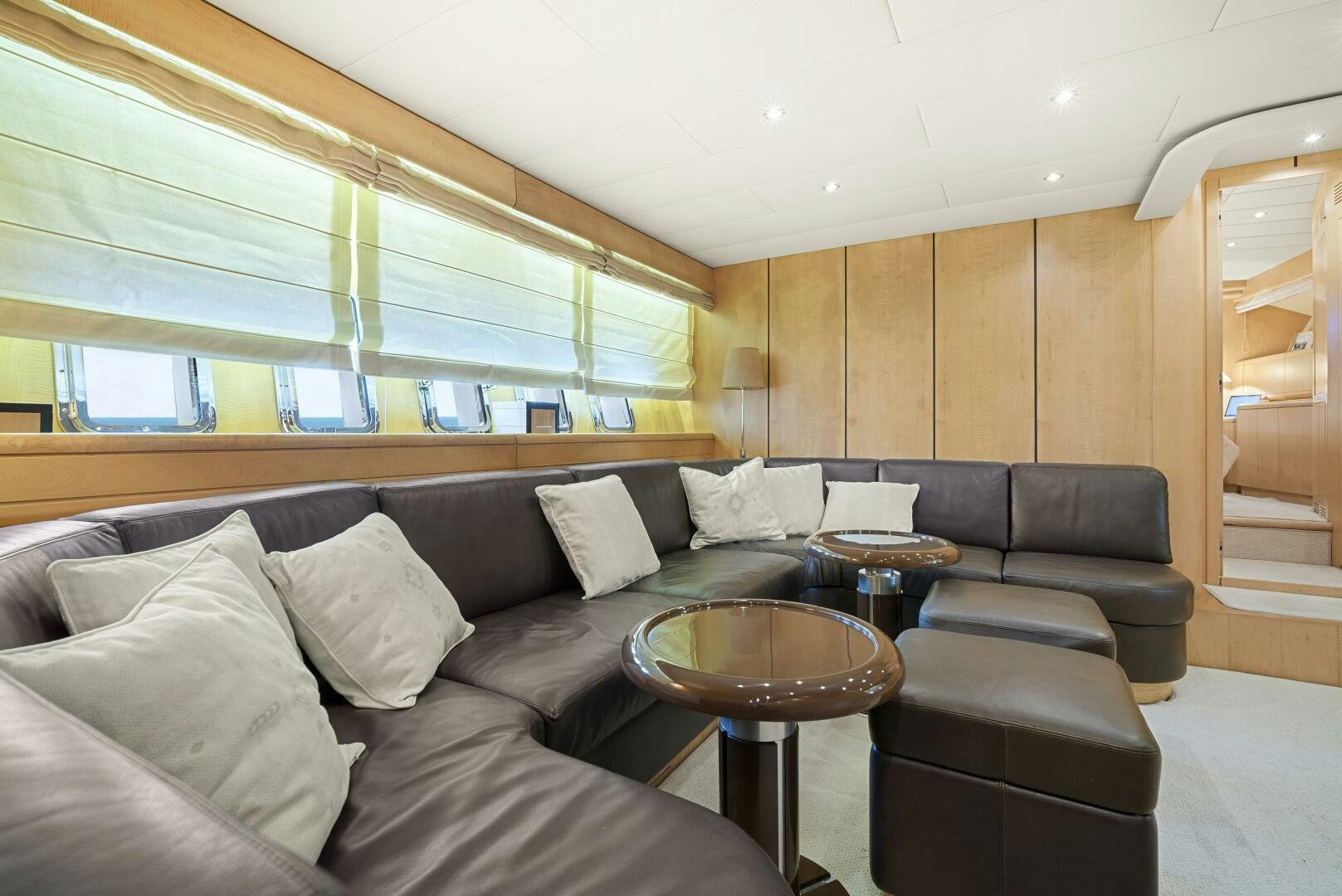 a living room with a couch and a table aboard NONE Yacht for Sale