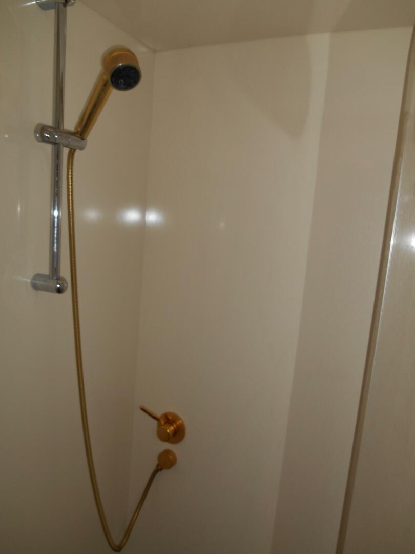 a shower head with a handle aboard LADY C Yacht for Sale