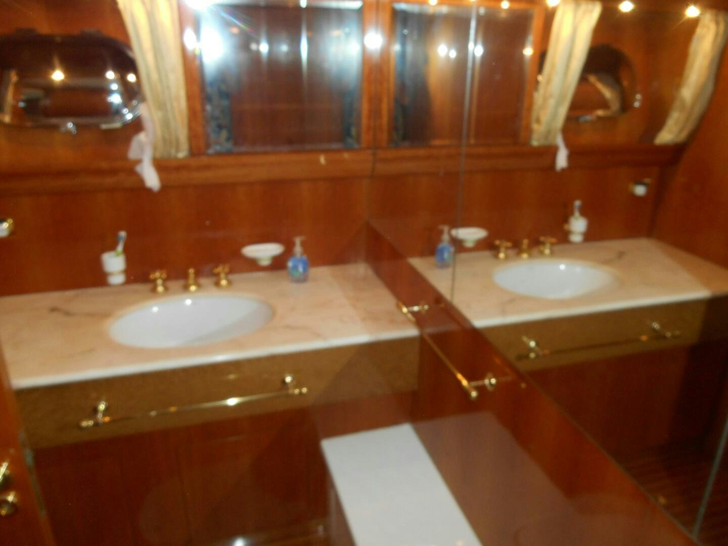 a bathroom with two sinks aboard LADY C Yacht for Sale