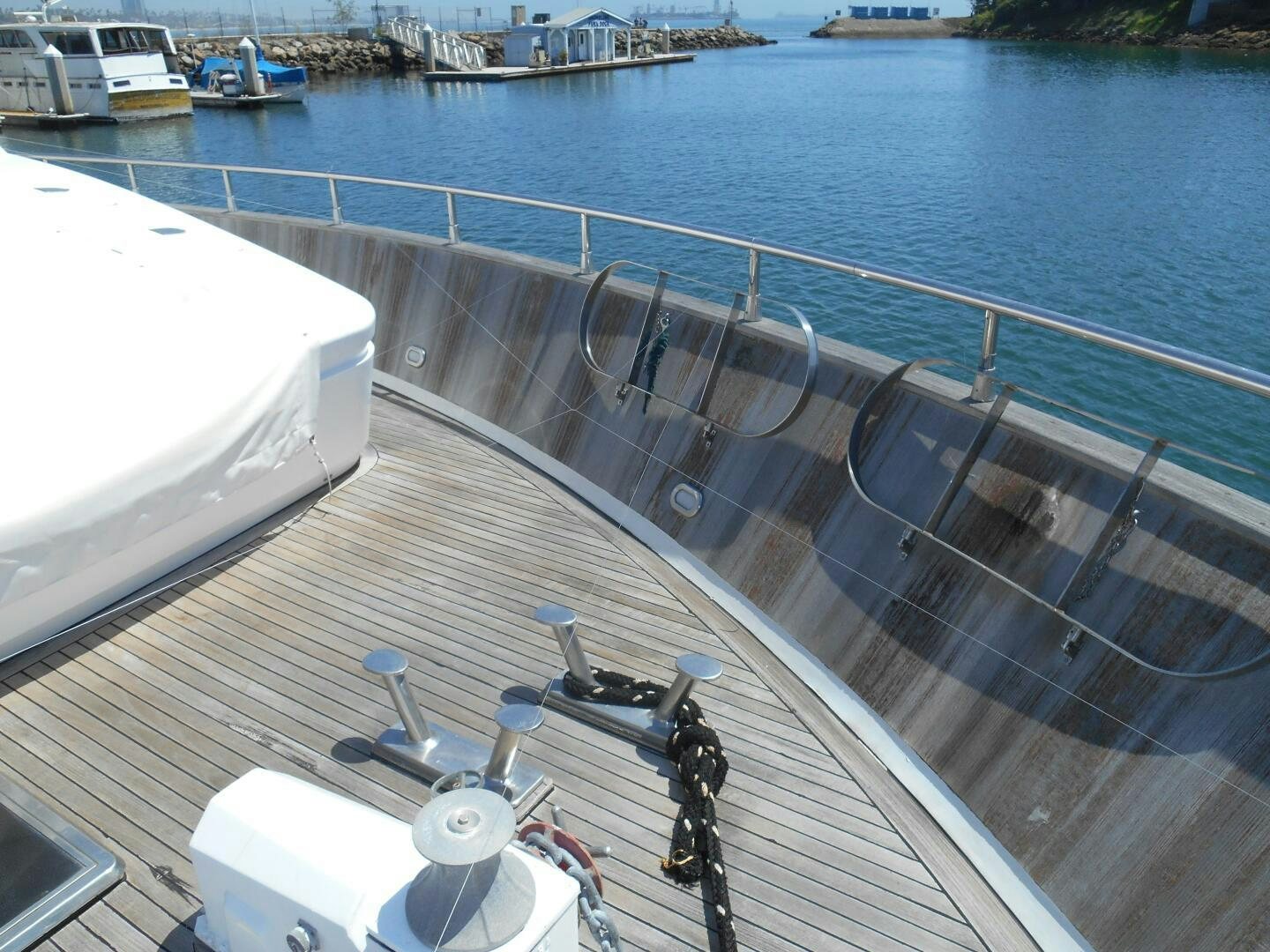 a boat with a person standing on it aboard LADY C Yacht for Sale