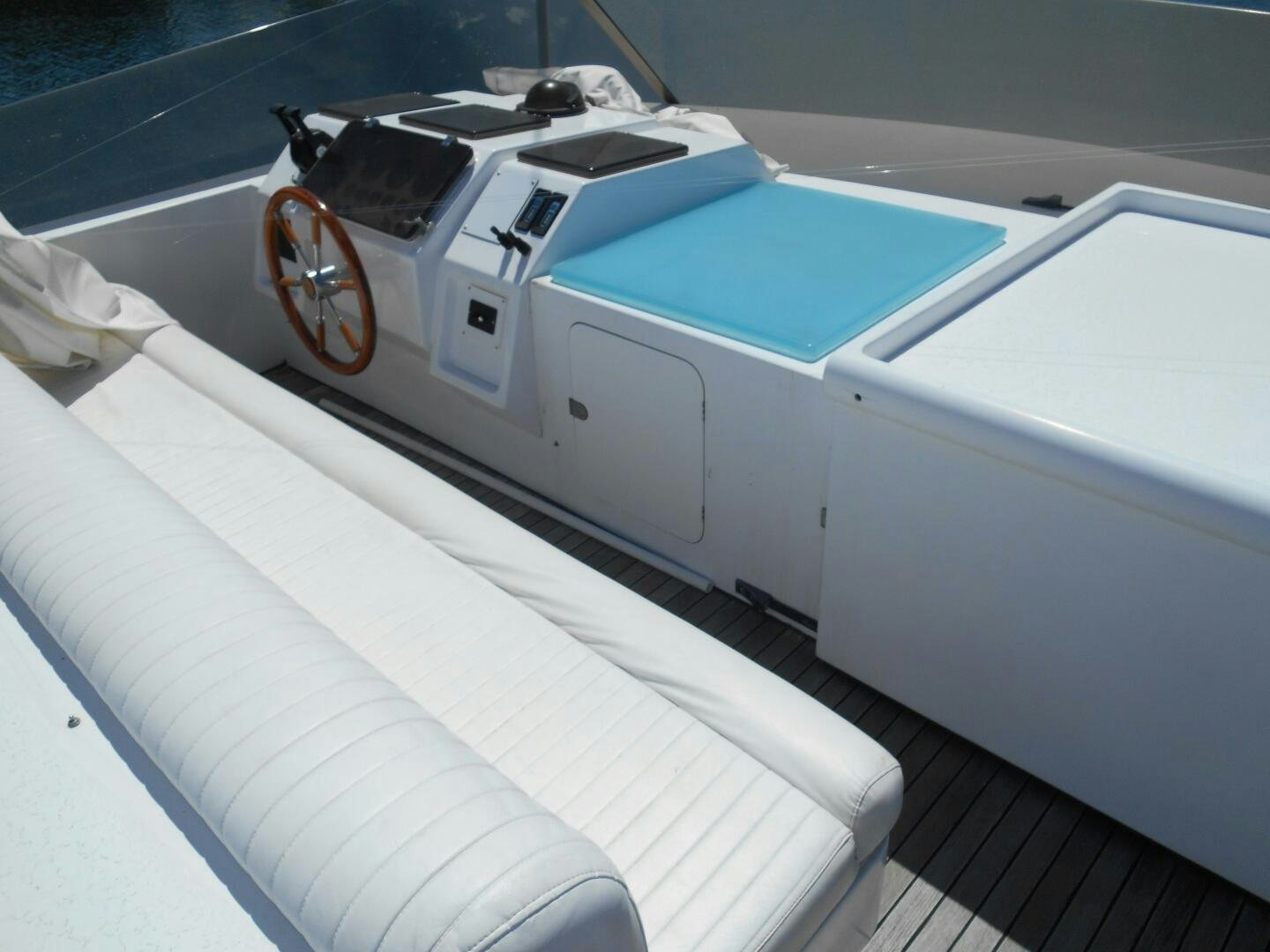 a white car with a red rim aboard LADY C Yacht for Sale