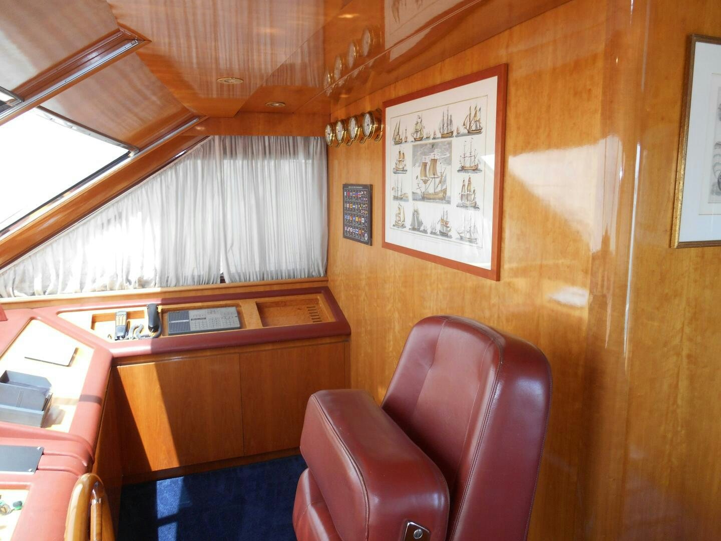 a room with a chair and a desk aboard LADY C Yacht for Sale