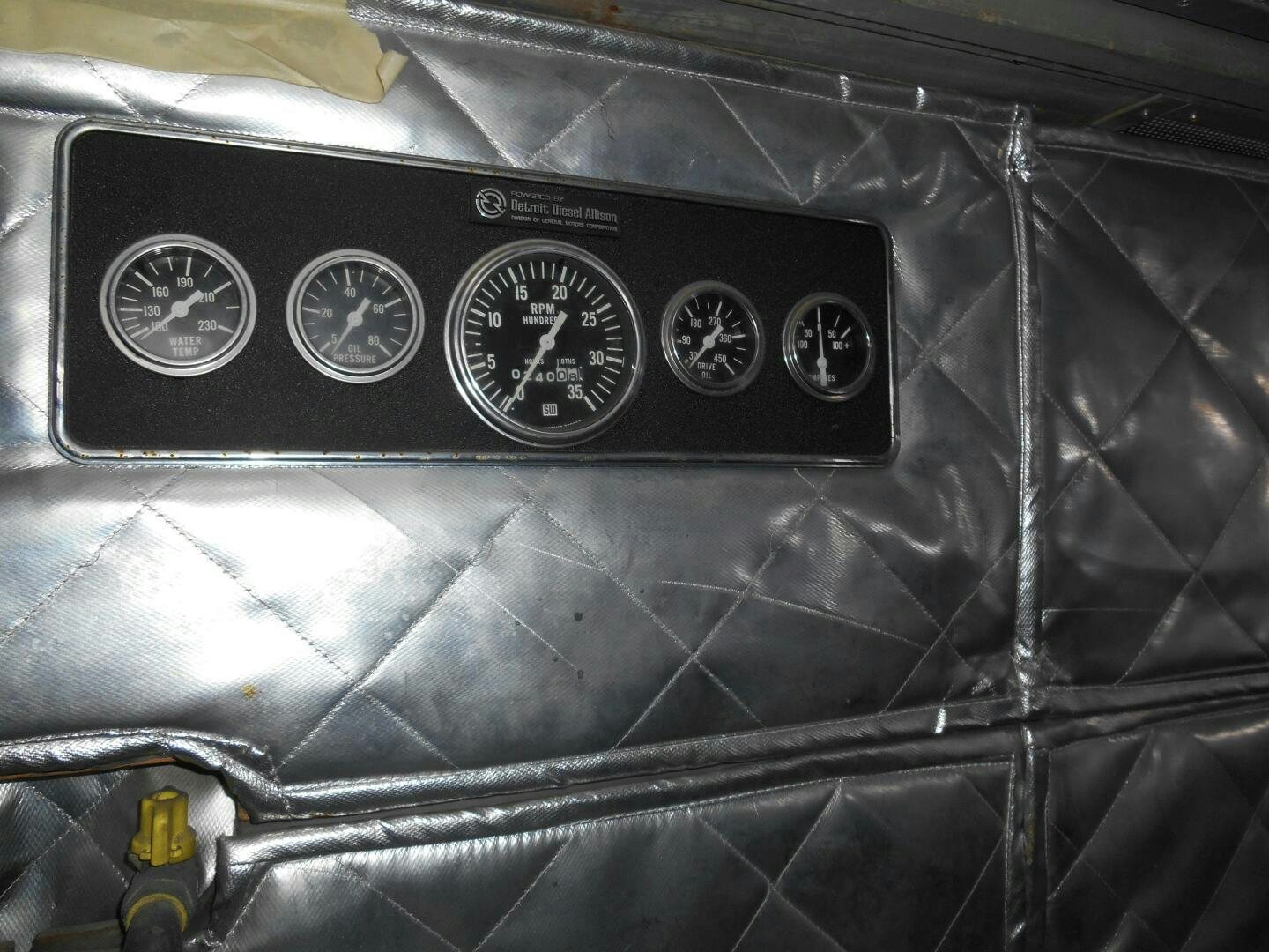 a close-up of a car engine aboard LADY C Yacht for Sale