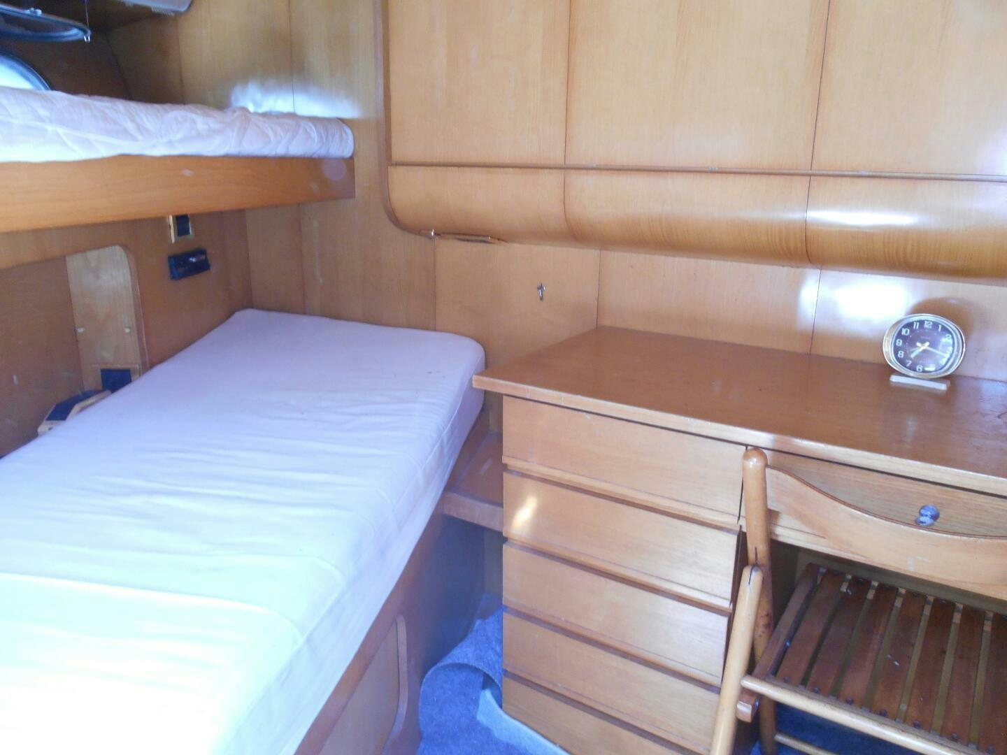 a wooden bunk bed aboard LADY C Yacht for Sale