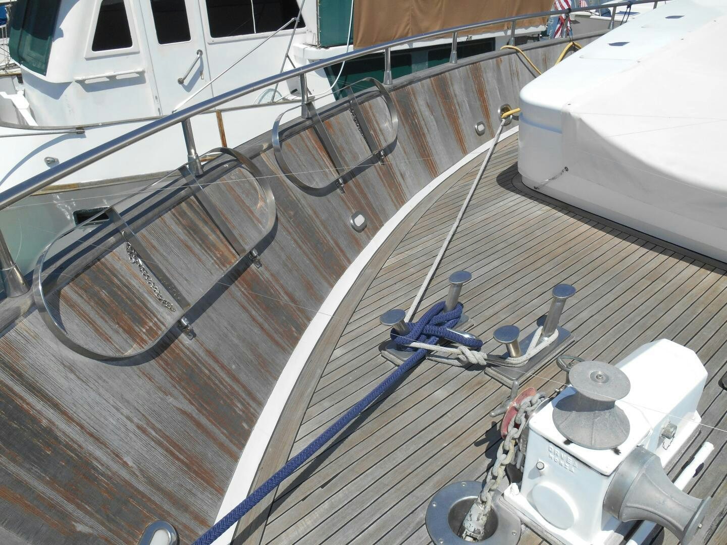 a bicycle on a wooden deck aboard LADY C Yacht for Sale