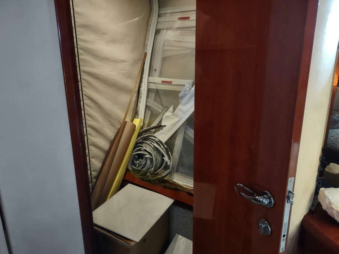 a door with a glass door aboard F66 Yacht for Sale