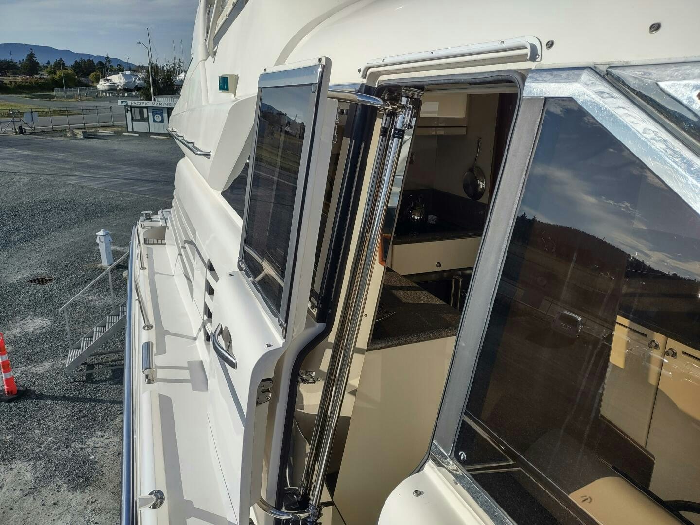 a white vehicle with a person inside aboard F66 Yacht for Sale