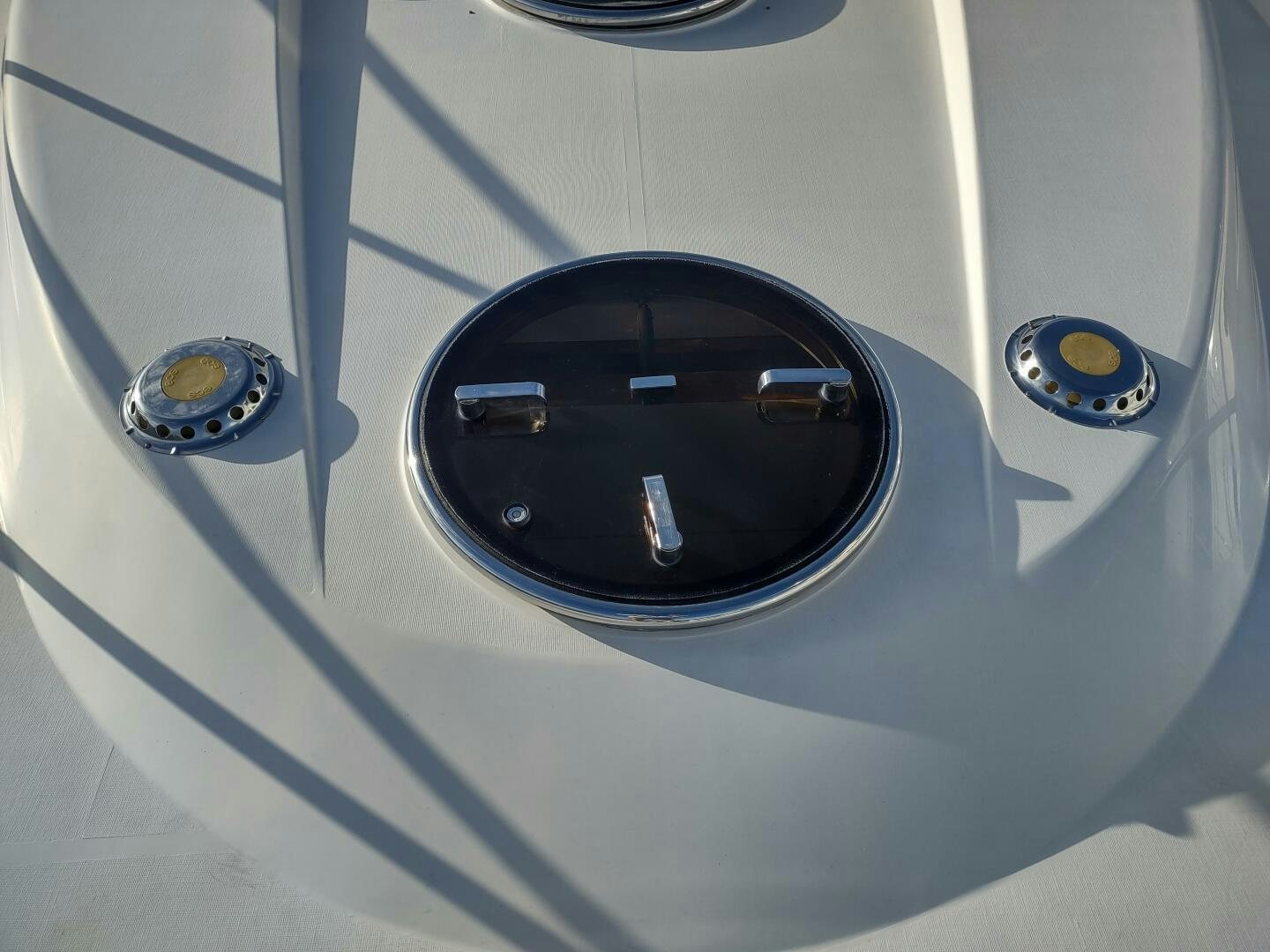a close-up of a car's side mirror aboard F66 Yacht for Sale