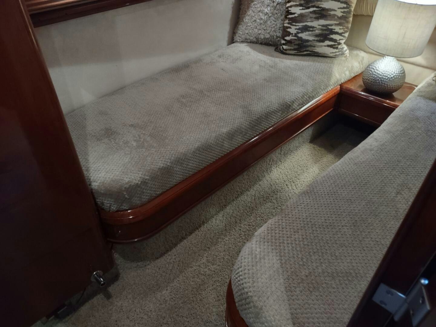 a bed with a pillow aboard F66 Yacht for Sale