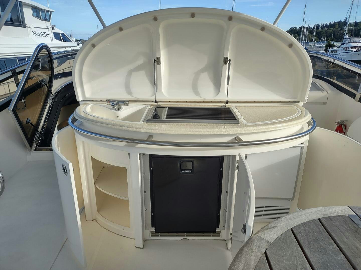 a white car with a large hood aboard F66 Yacht for Sale