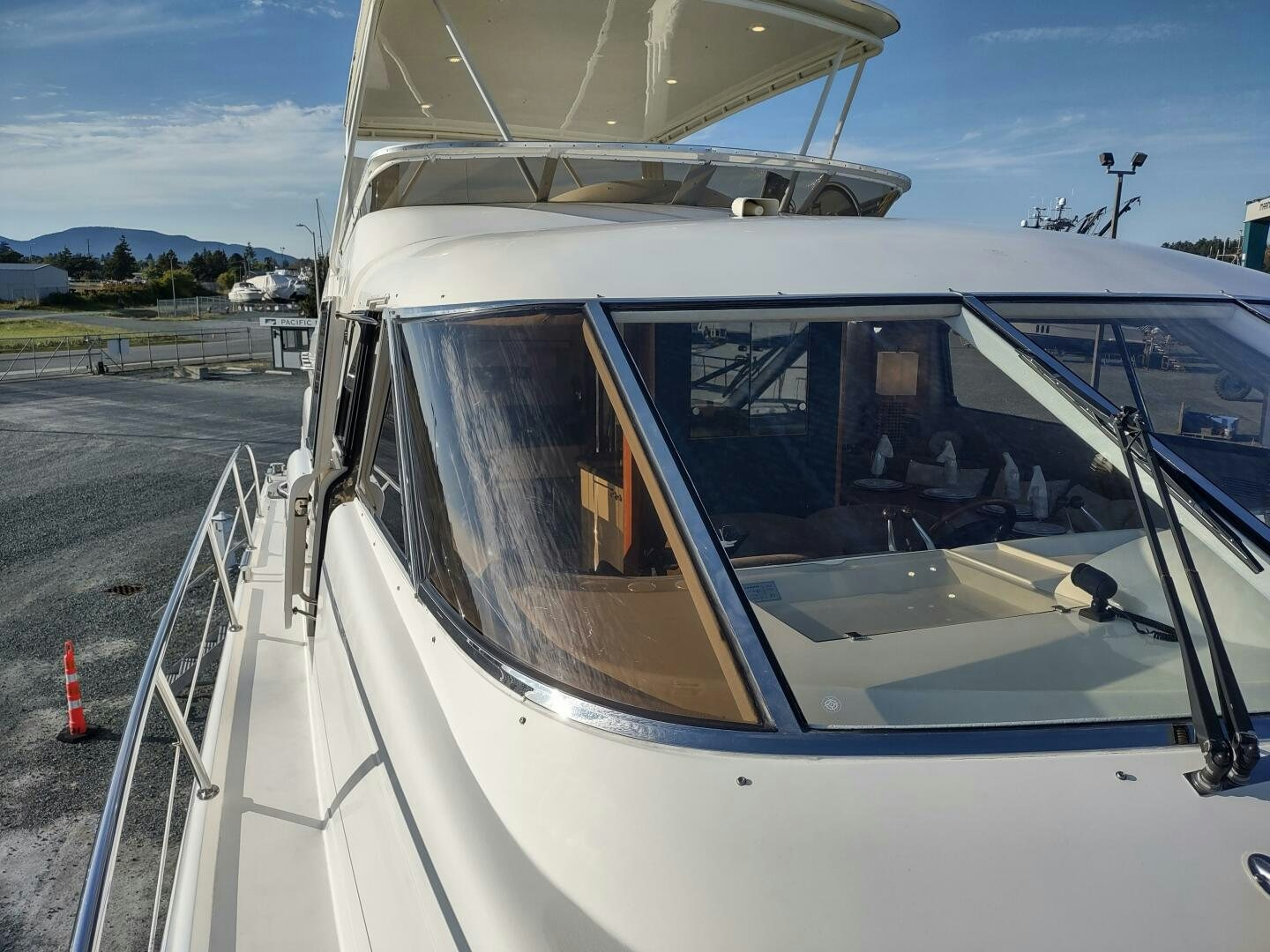 a car on the road aboard F66 Yacht for Sale
