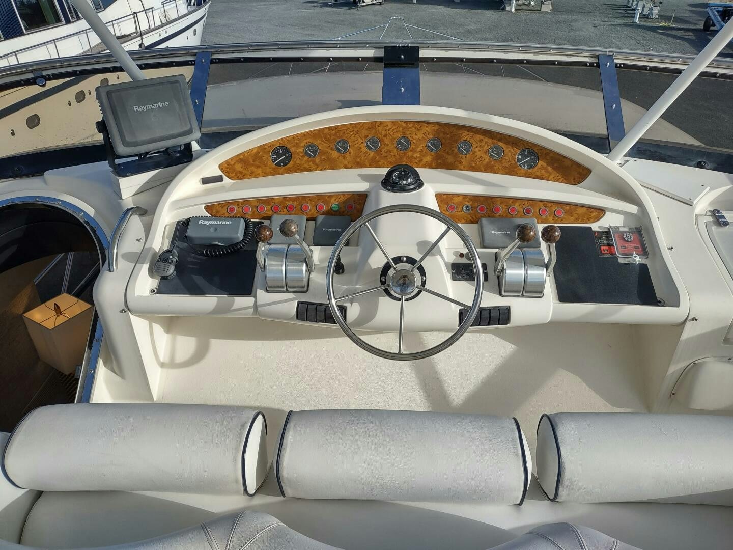 the inside of a car aboard F66 Yacht for Sale