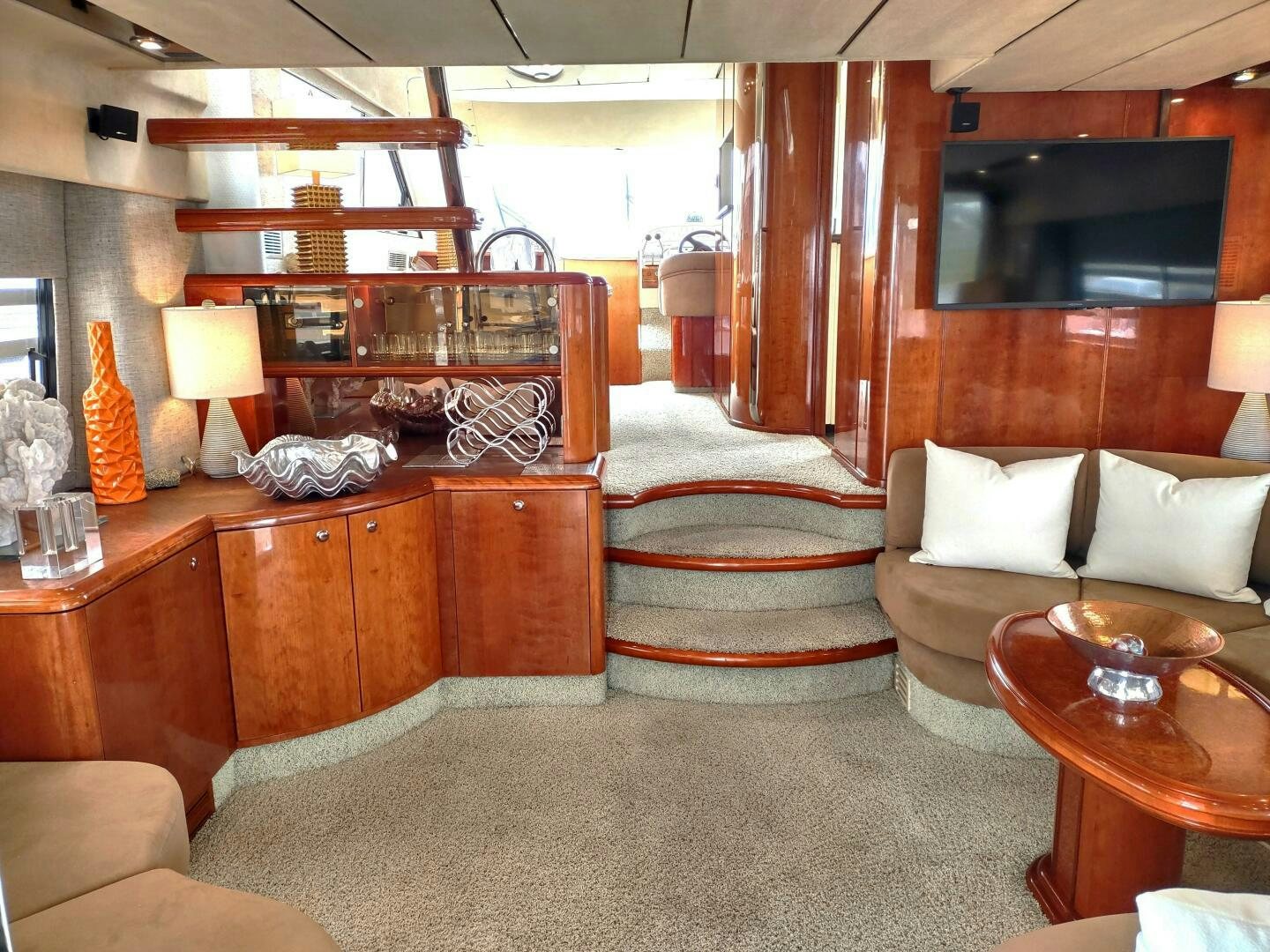 a living room with a bed and a coffee table aboard F66 Yacht for Sale