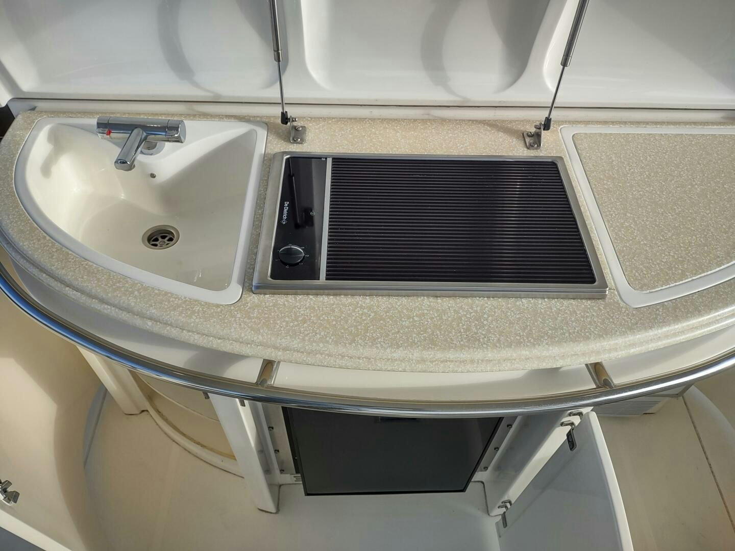 a sink with a black faucet aboard F66 Yacht for Sale