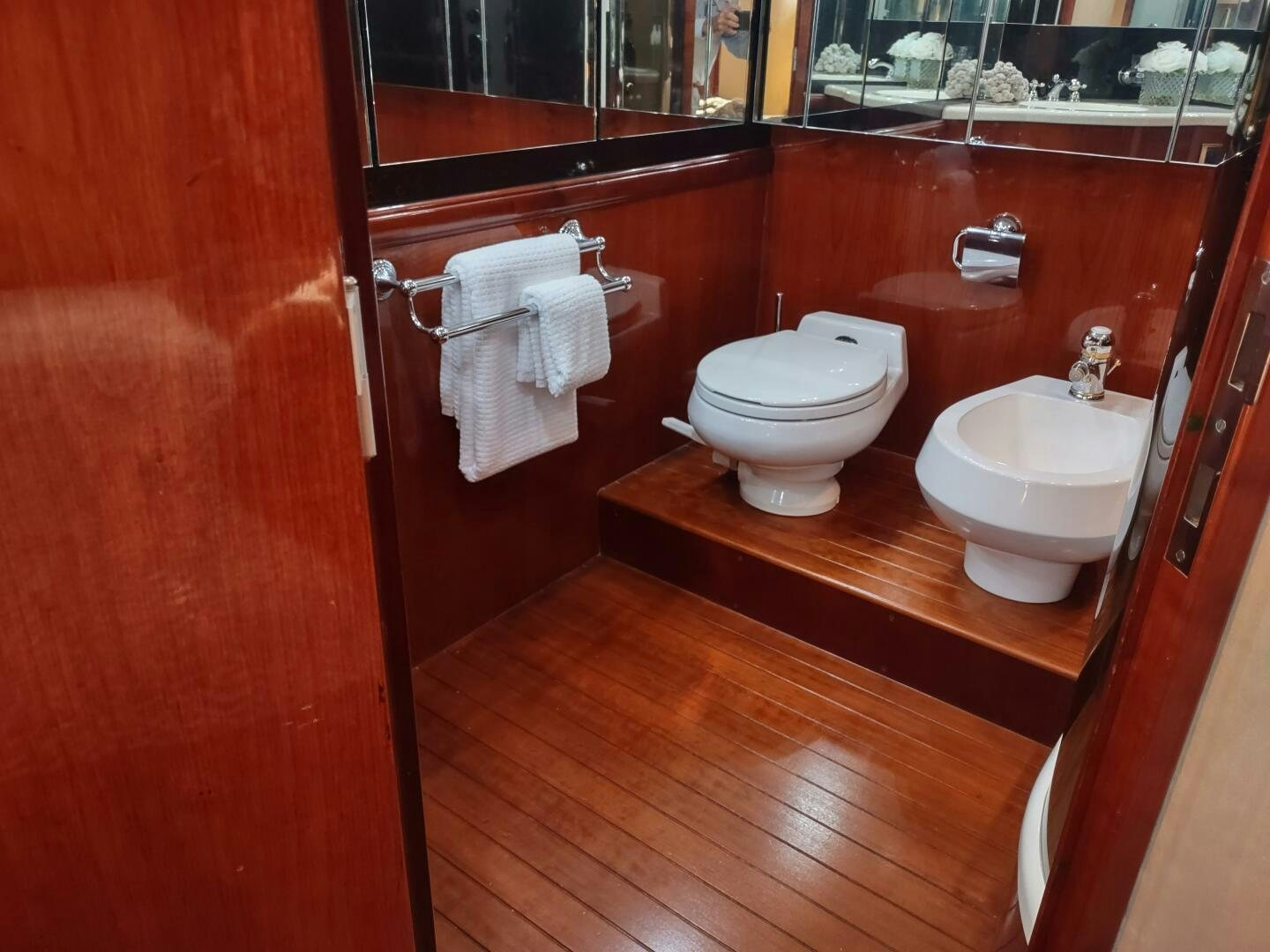 a bathroom with a toilet and sink aboard F66 Yacht for Sale