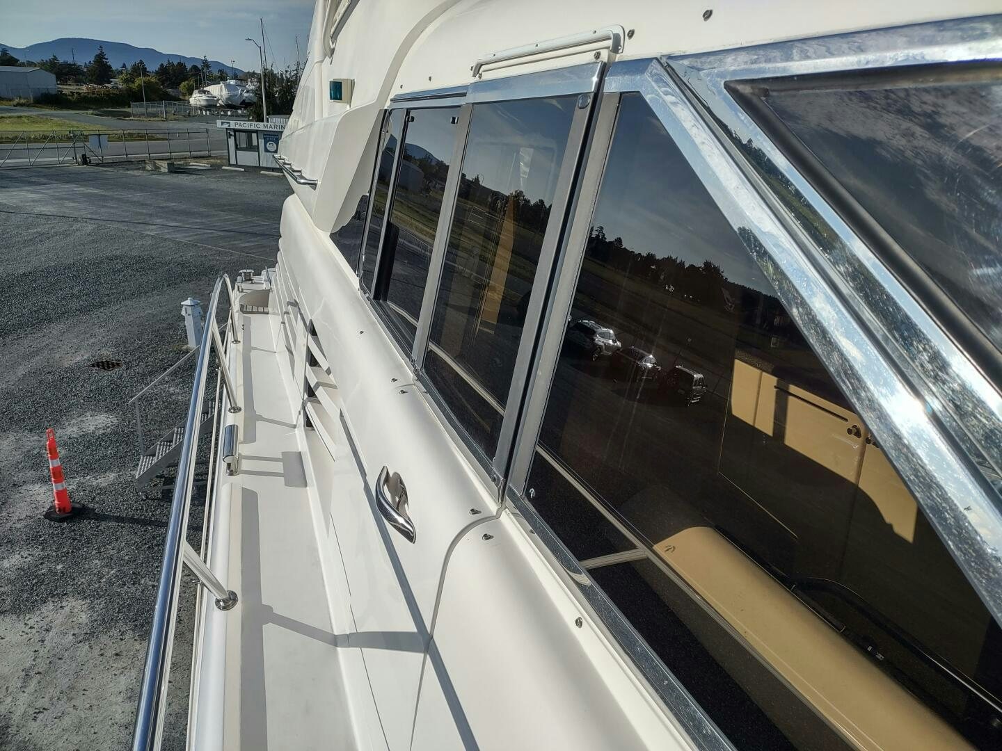 a car on the road aboard F66 Yacht for Sale