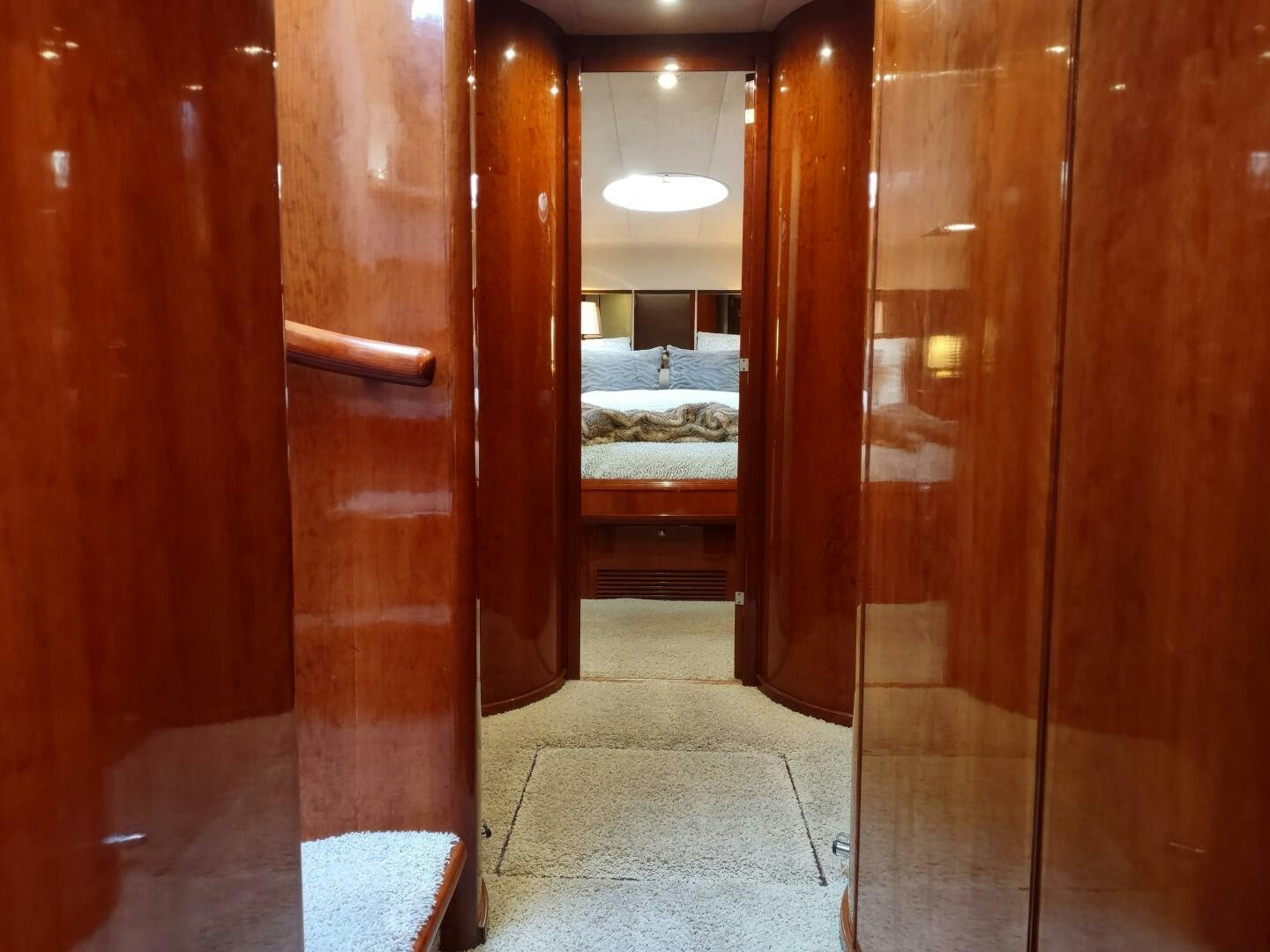 a room with wooden doors aboard F66 Yacht for Sale
