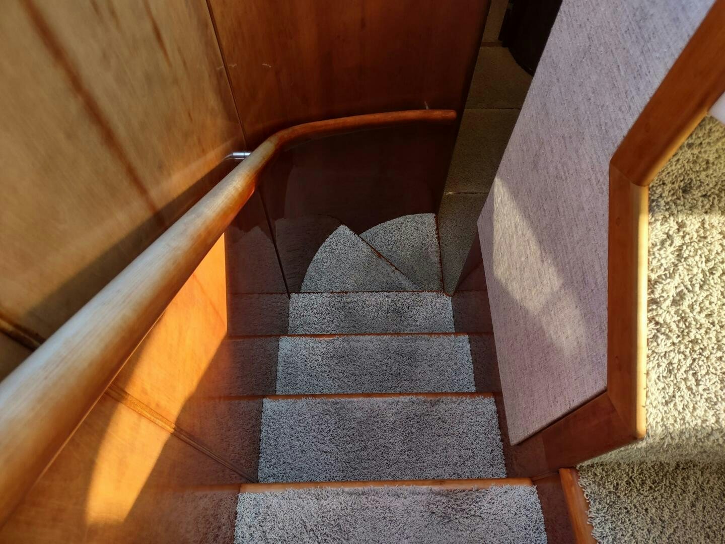 a staircase with a carpet aboard F66 Yacht for Sale