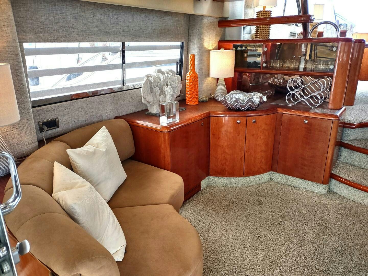 a living room with a couch and a coffee table aboard F66 Yacht for Sale