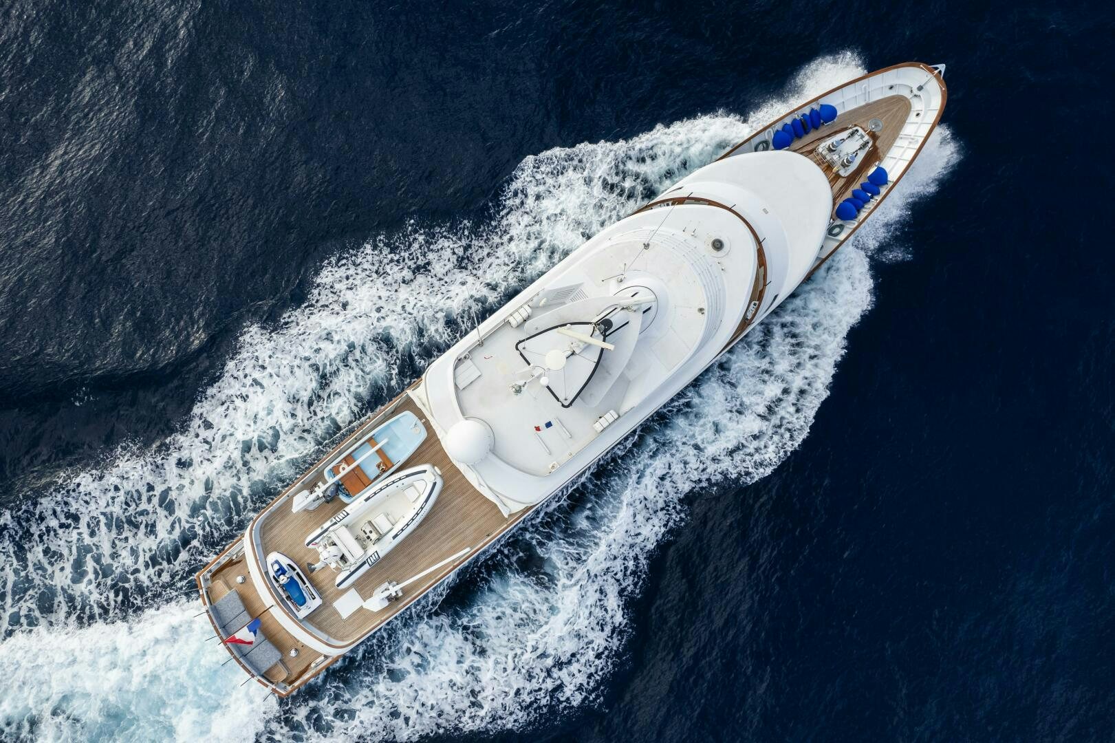 a guitar on a rock aboard BLUEMAR II Yacht for Sale