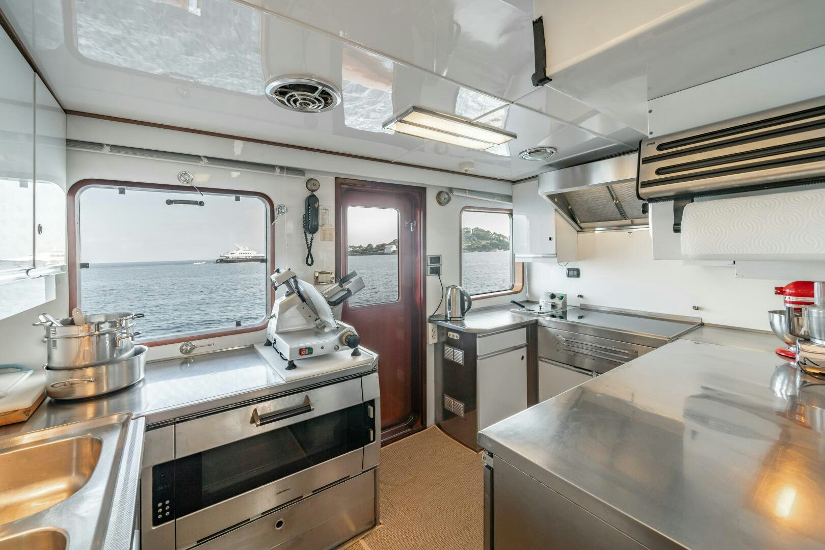 a kitchen with a large oven aboard BLUEMAR II Yacht for Sale