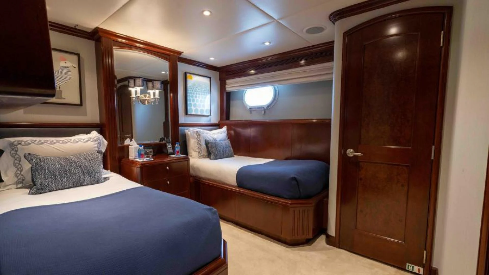 a room with two beds aboard ODIN Yacht for Sale