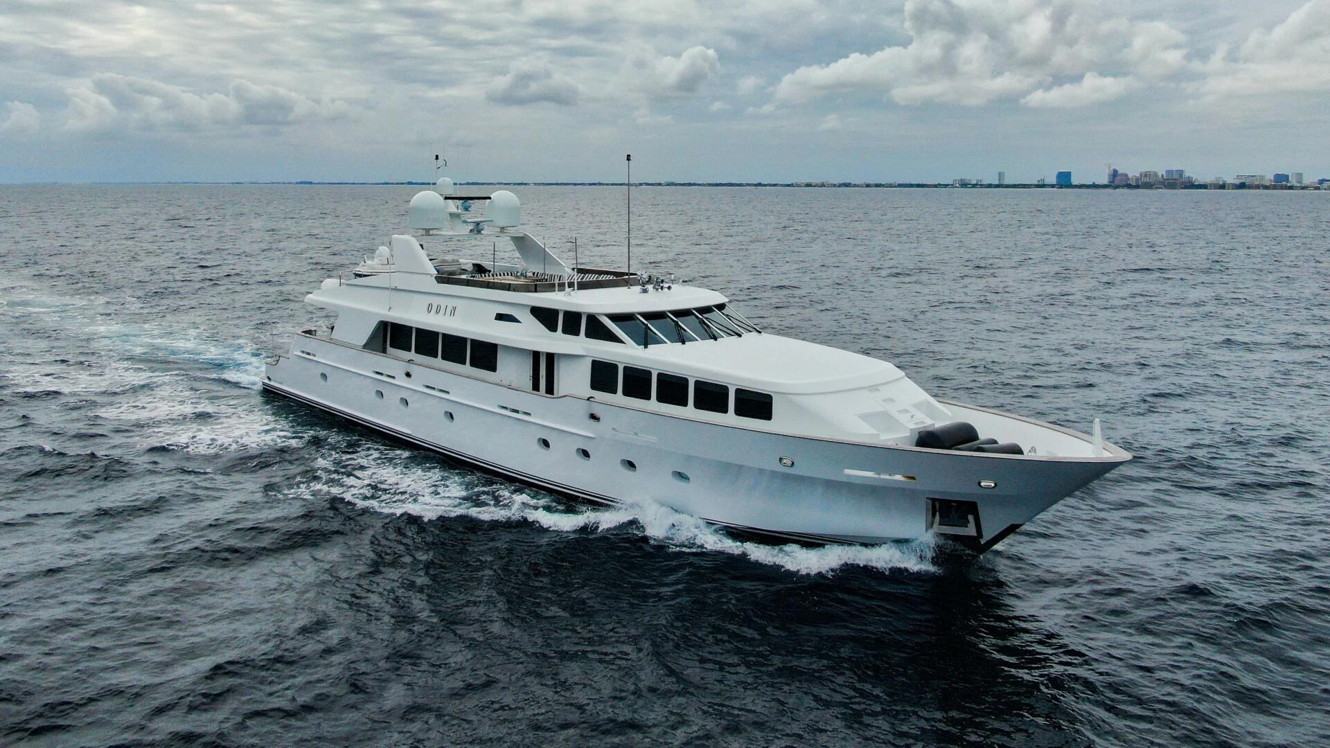 a white yacht in the water aboard ODIN Yacht for Sale