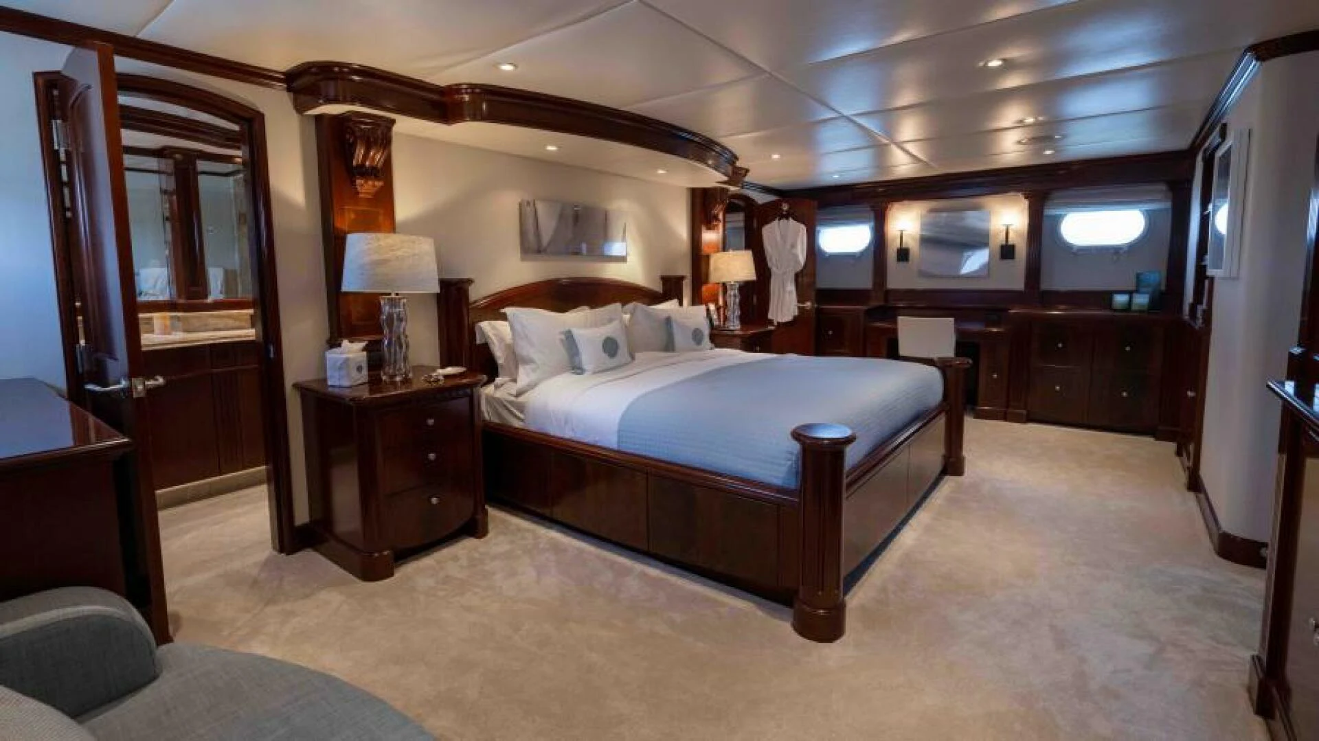 a large bedroom with a bed aboard ODIN Yacht for Sale
