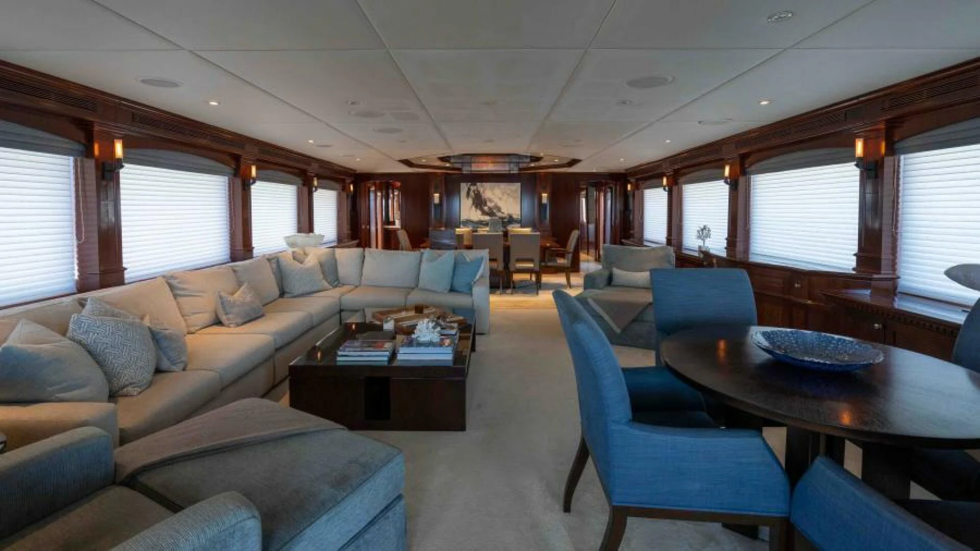 a living room with a couch and a table aboard ODIN Yacht for Sale