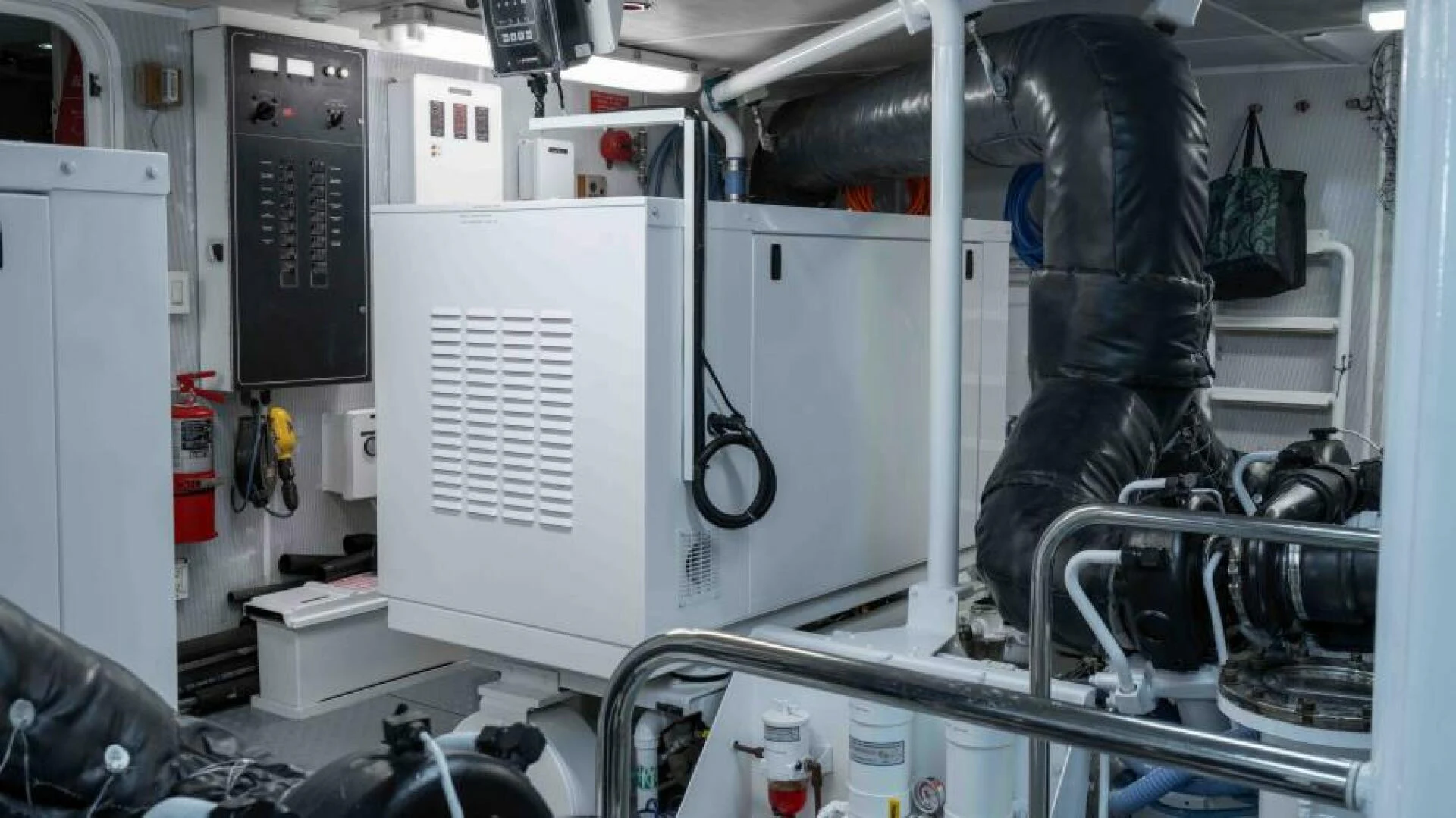 a person working in a factory aboard ODIN Yacht for Sale