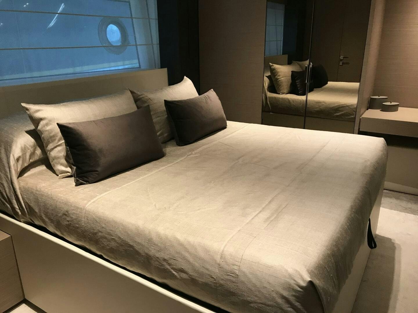 a bed with white sheets aboard MARIA THERESA Yacht for Sale