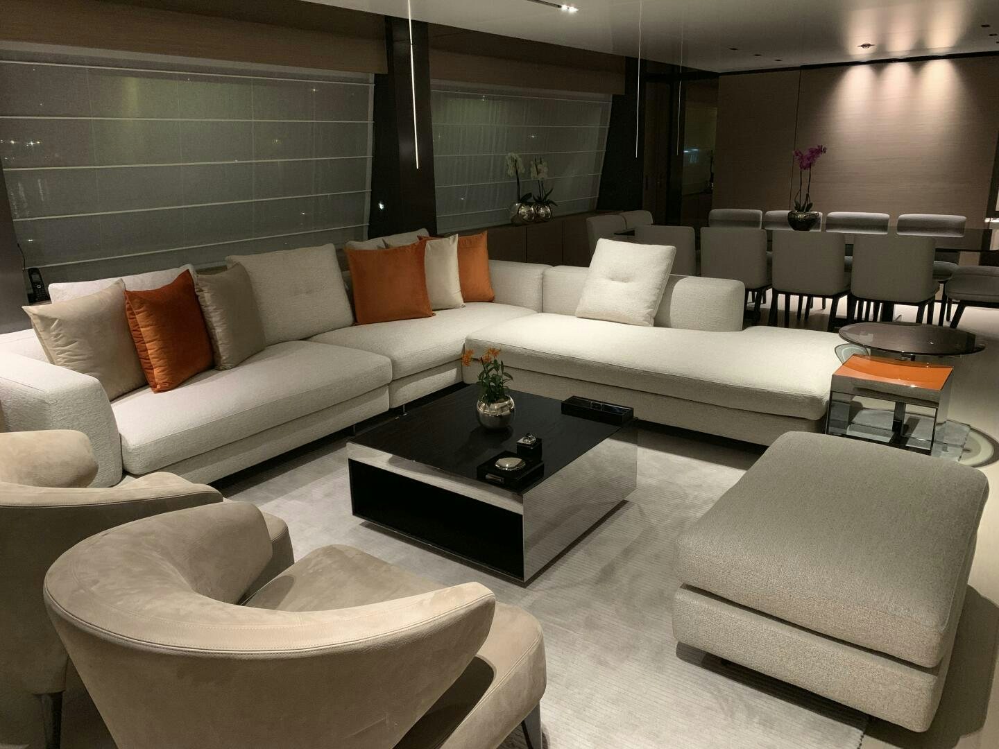 a living room with a white couch aboard MARIA THERESA Yacht for Sale