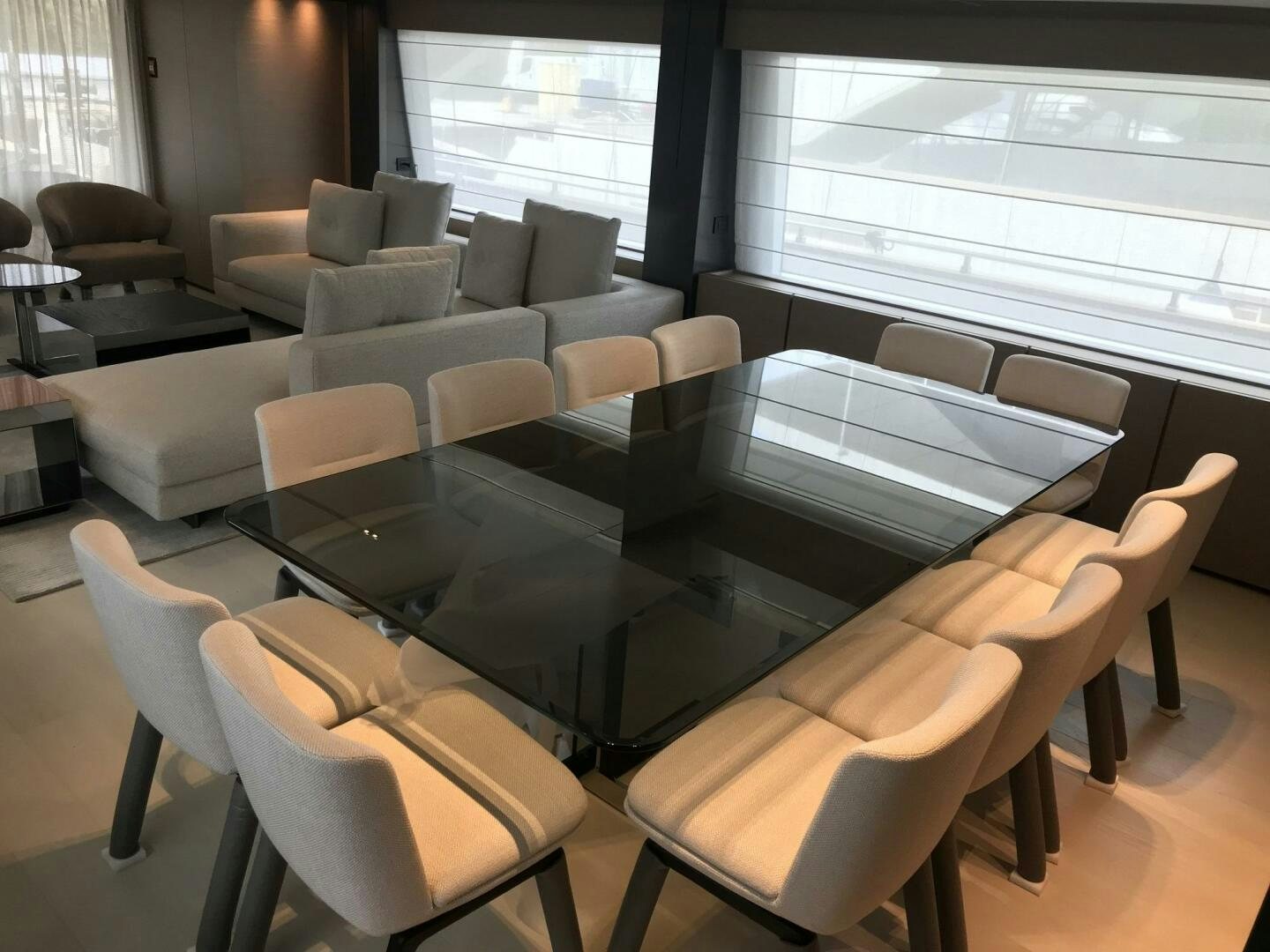 a room with a table and chairs aboard MARIA THERESA Yacht for Sale