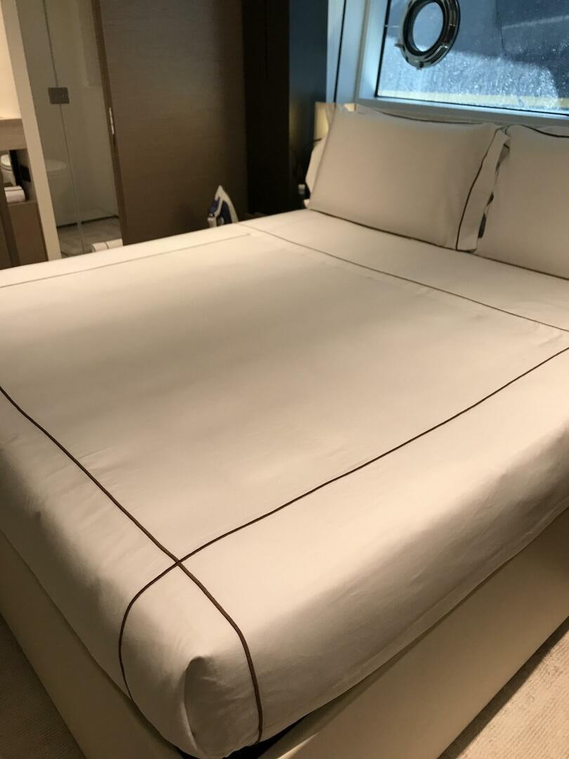 a white couch in a room aboard MARIA THERESA Yacht for Sale