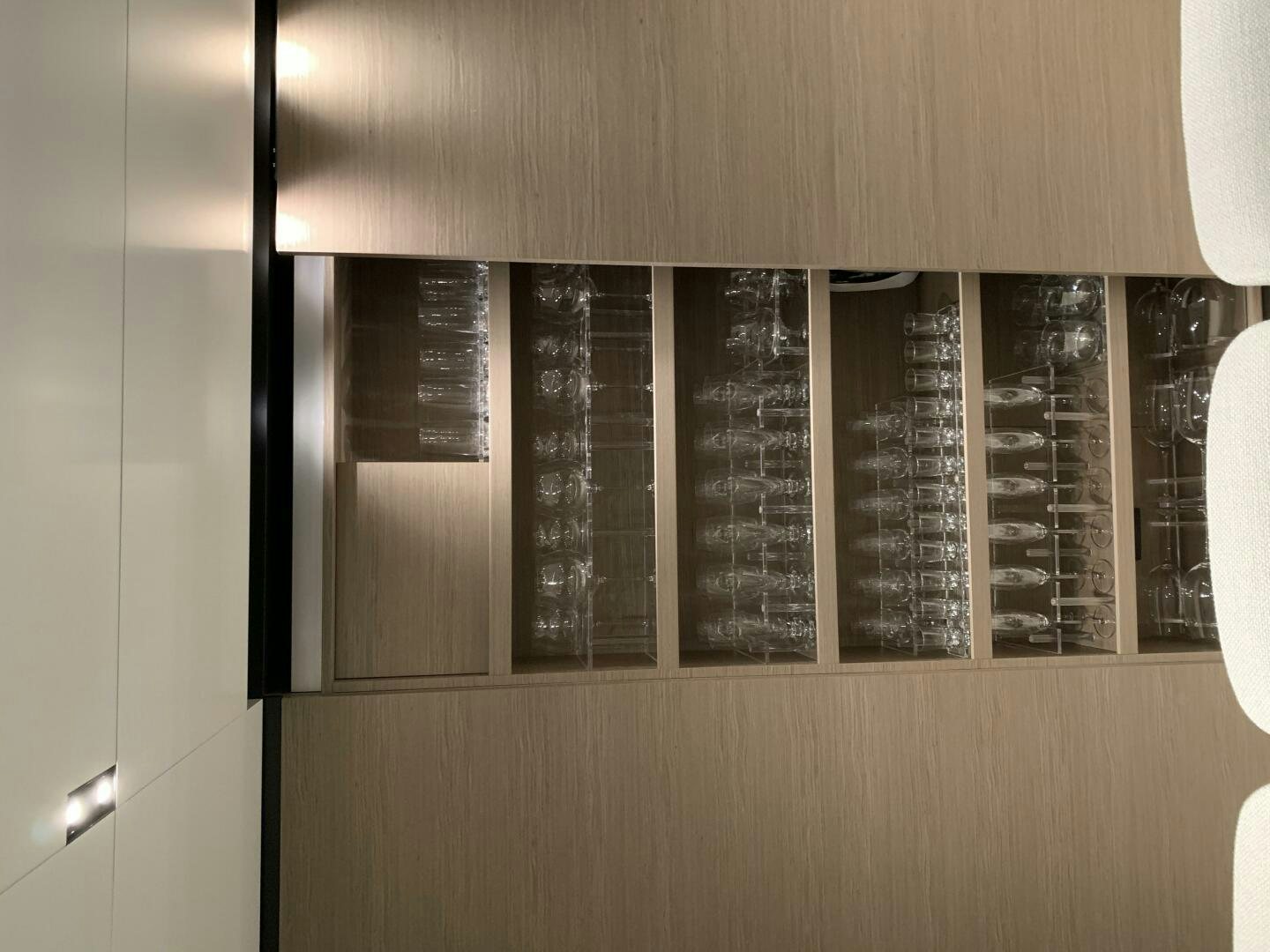 a group of books on a shelf aboard MARIA THERESA Yacht for Sale