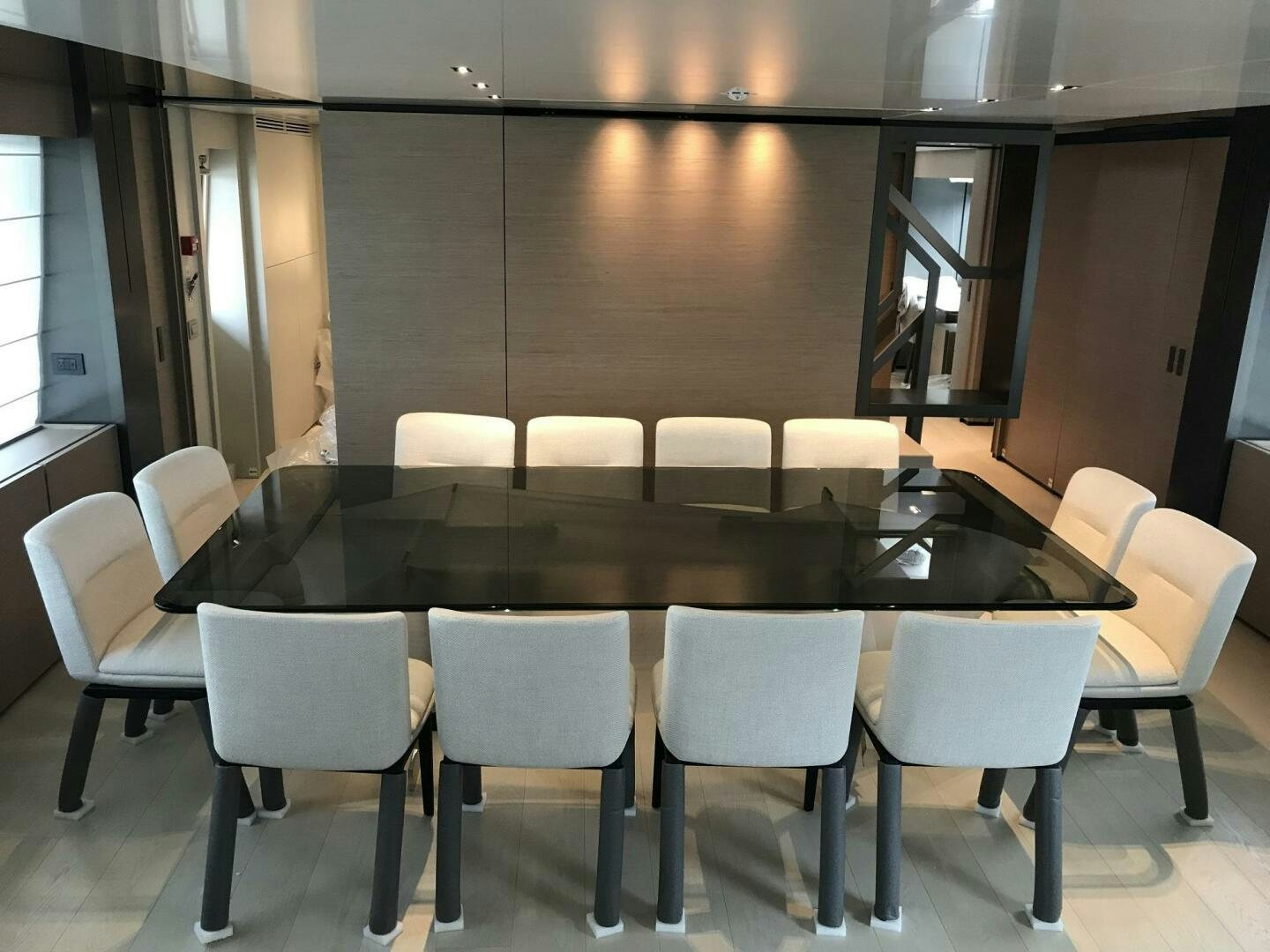 a conference room with a table and chairs aboard MARIA THERESA Yacht for Sale