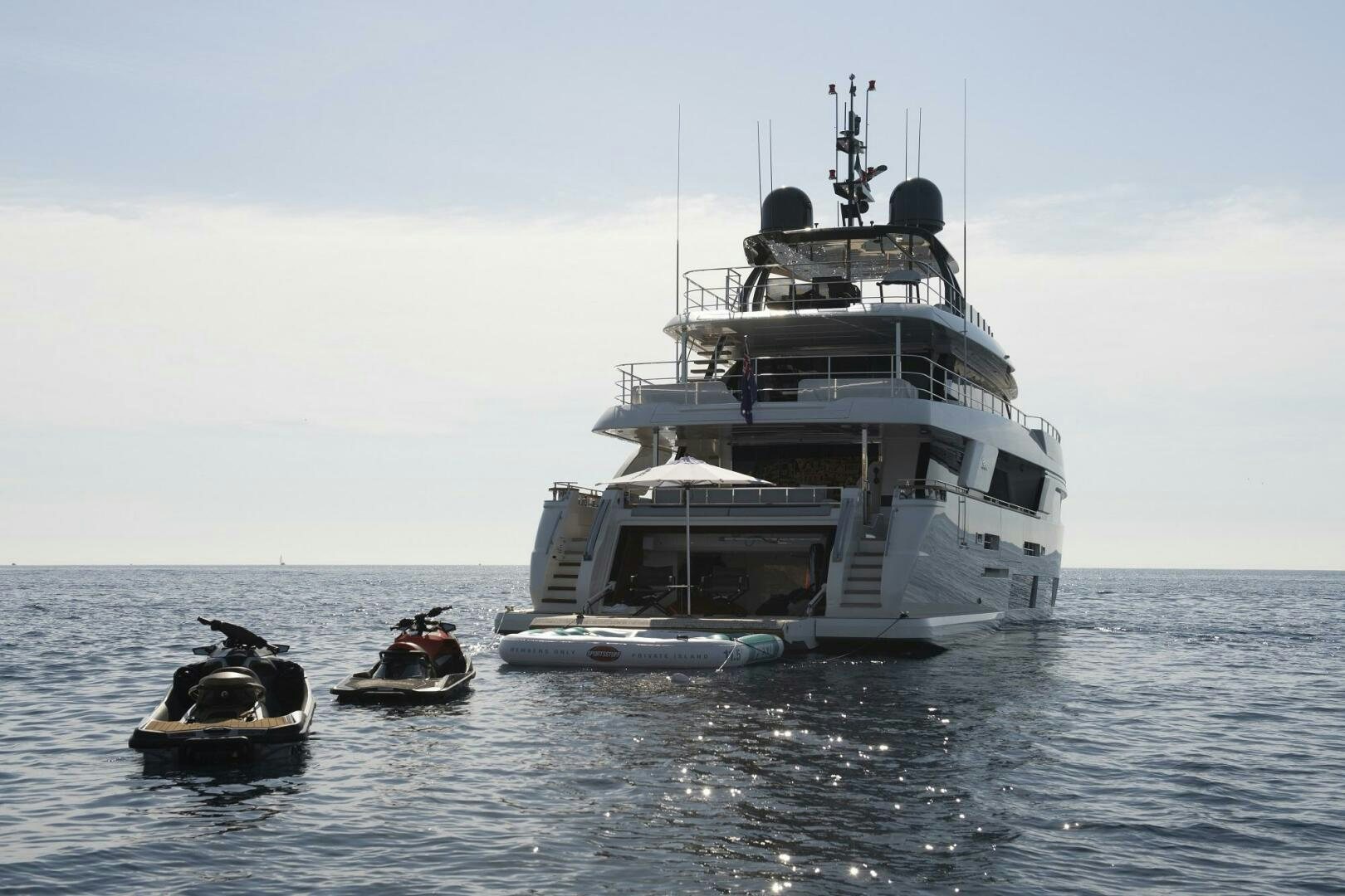 a large boat with a smaller boat in it aboard MARIA THERESA Yacht for Sale