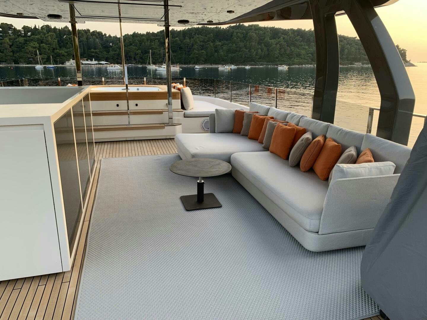 a couch and a table in a room aboard MARIA THERESA Yacht for Sale