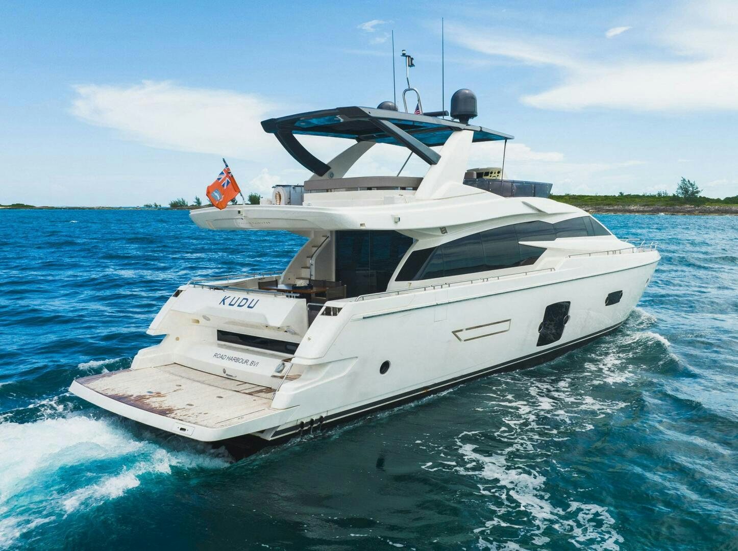 a white boat on the water aboard KUDU Yacht for Sale