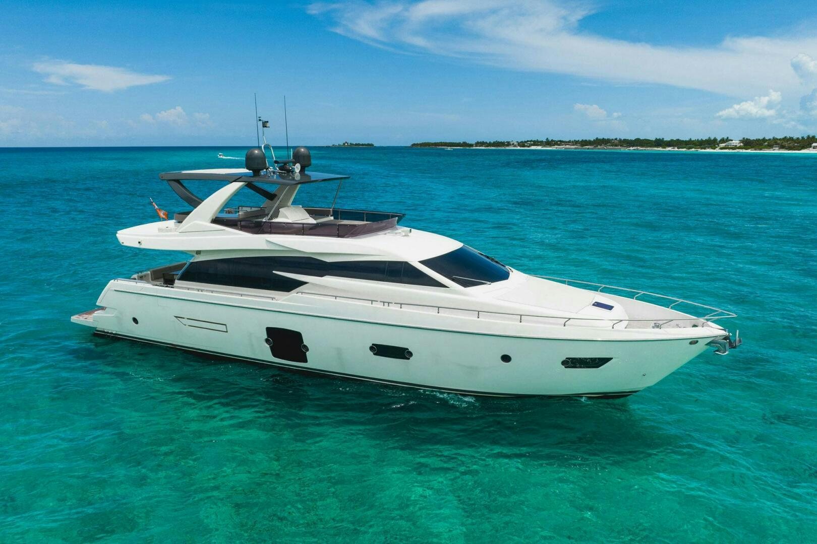 a white boat in the water aboard KUDU Yacht for Sale
