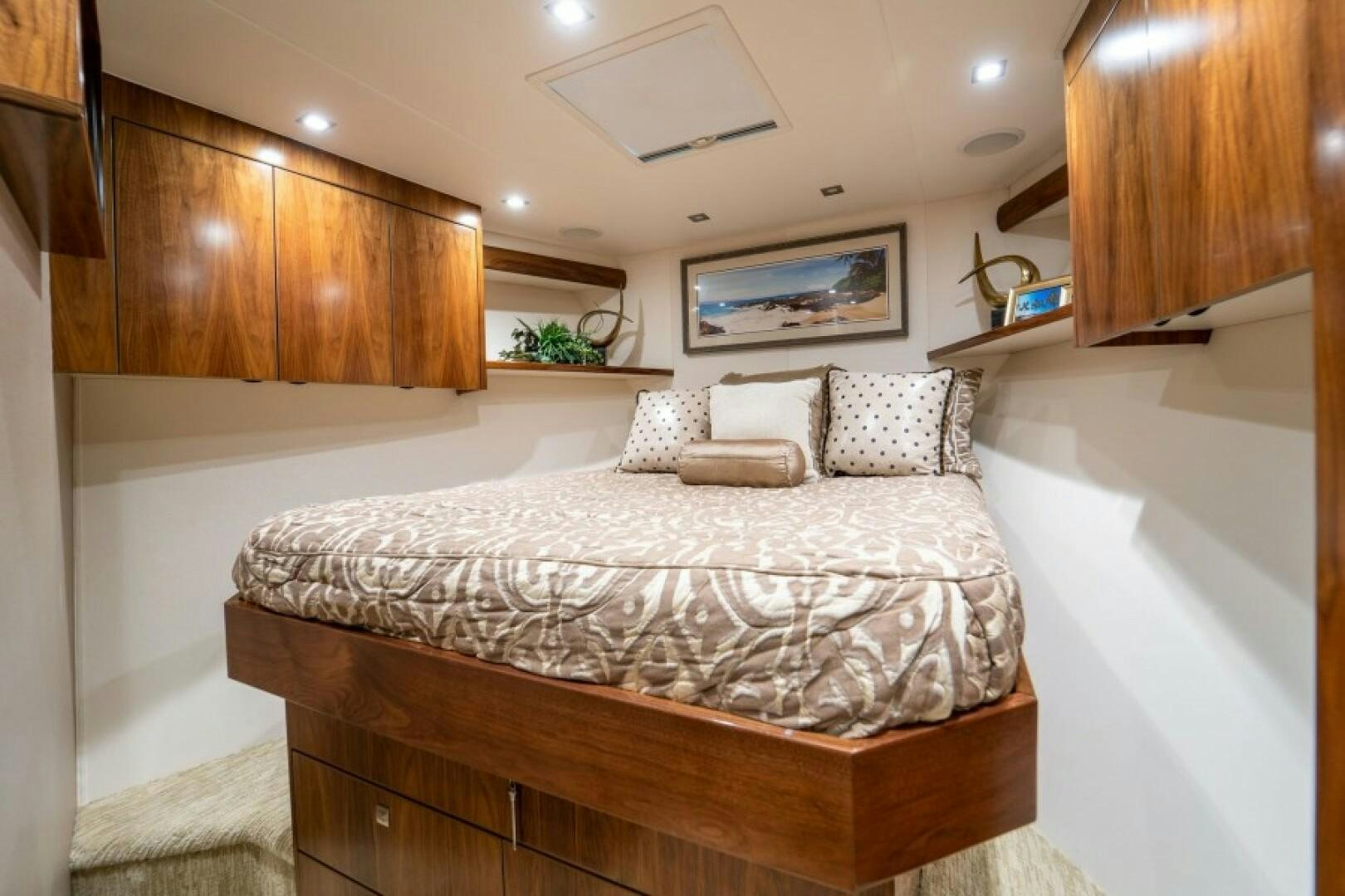 a large bed in a room aboard WRAPPED UP Yacht for Sale