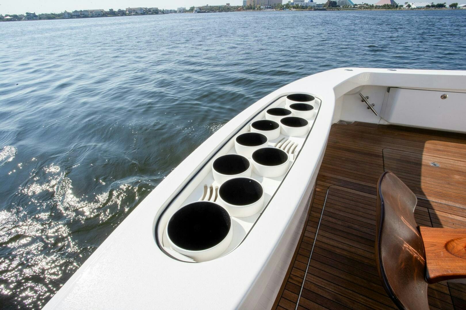 a boat with a steering wheel aboard WRAPPED UP Yacht for Sale