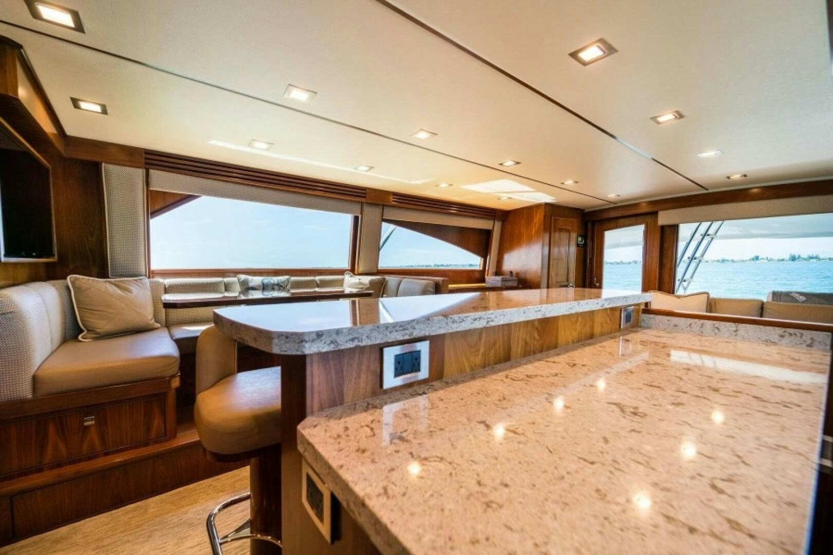a large kitchen with a large island aboard WRAPPED UP Yacht for Sale