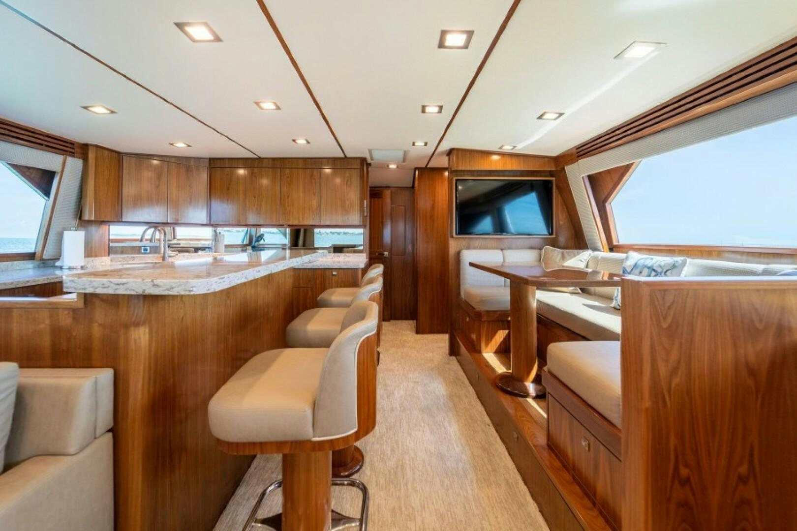 a large kitchen with a large island aboard WRAPPED UP Yacht for Sale