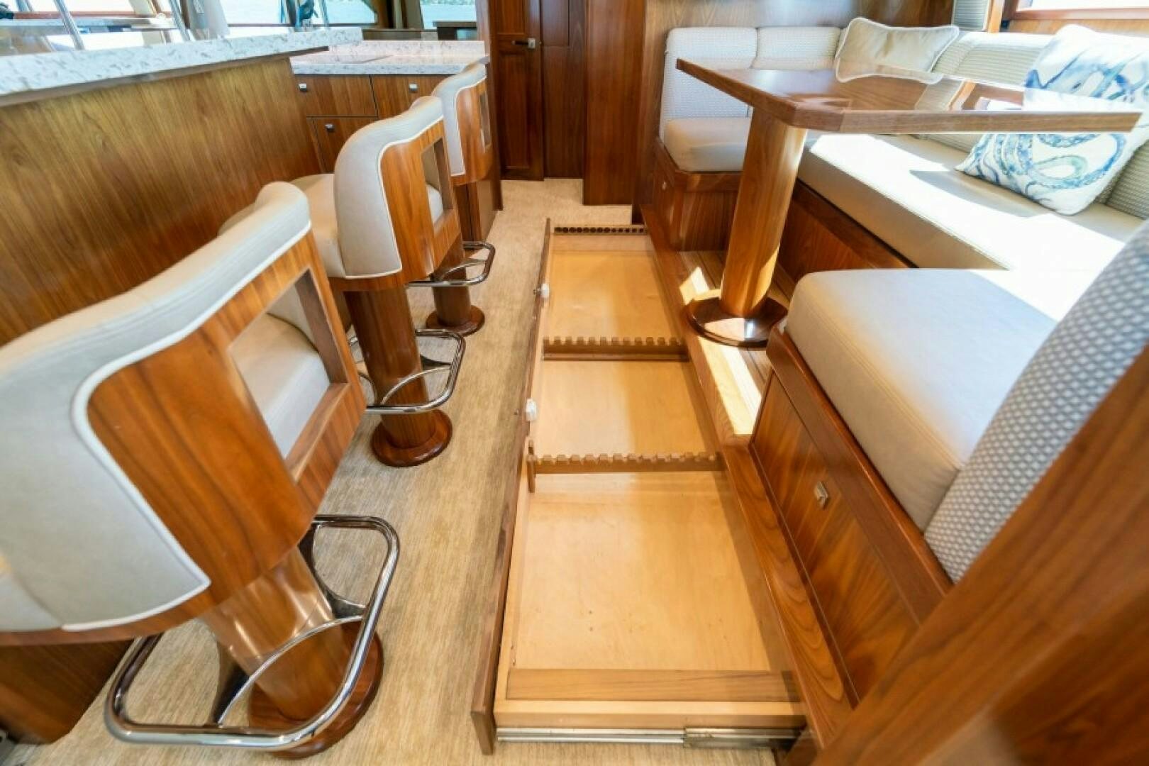 a wooden chair in a room aboard WRAPPED UP Yacht for Sale