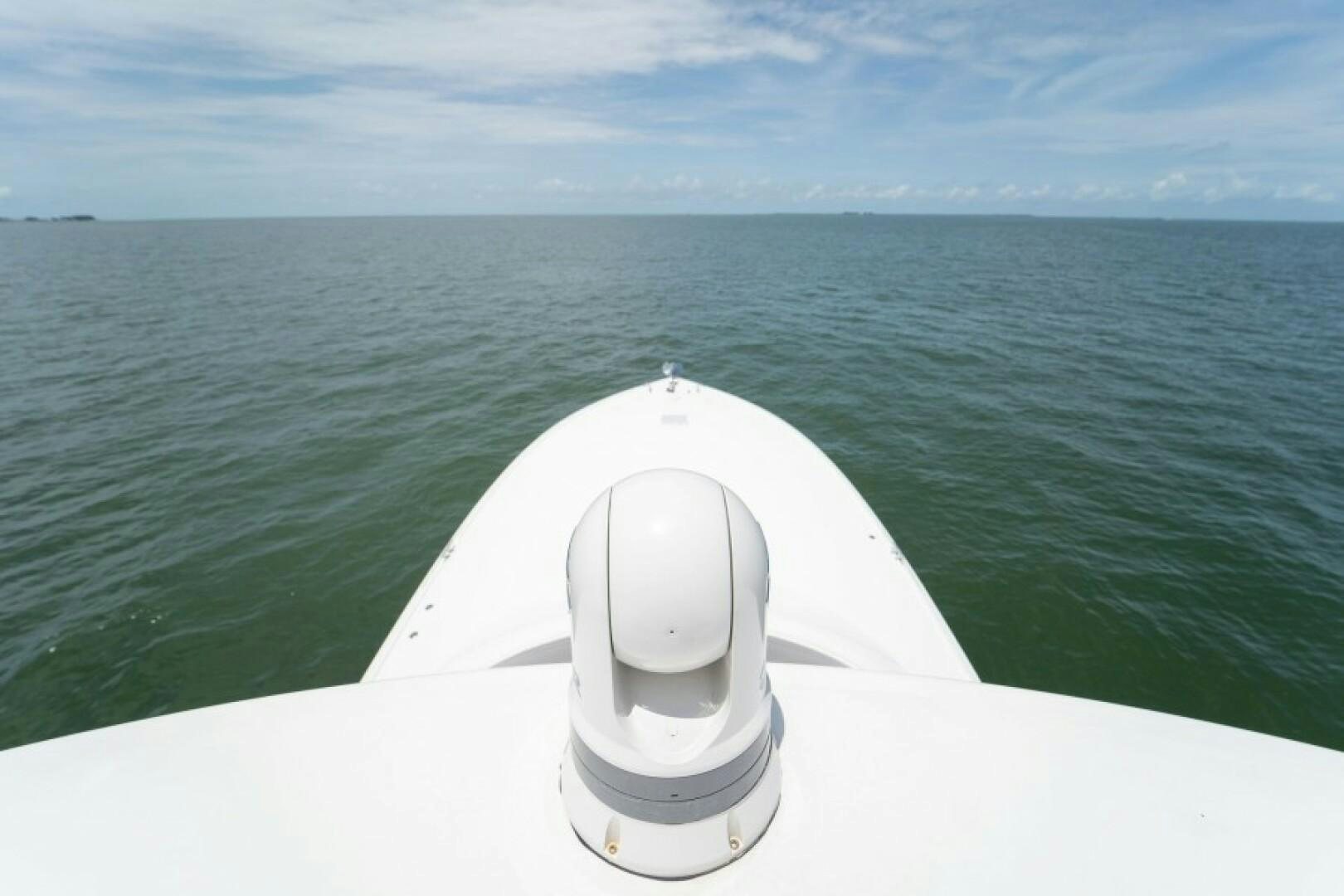 a white boat in the water aboard WRAPPED UP Yacht for Sale