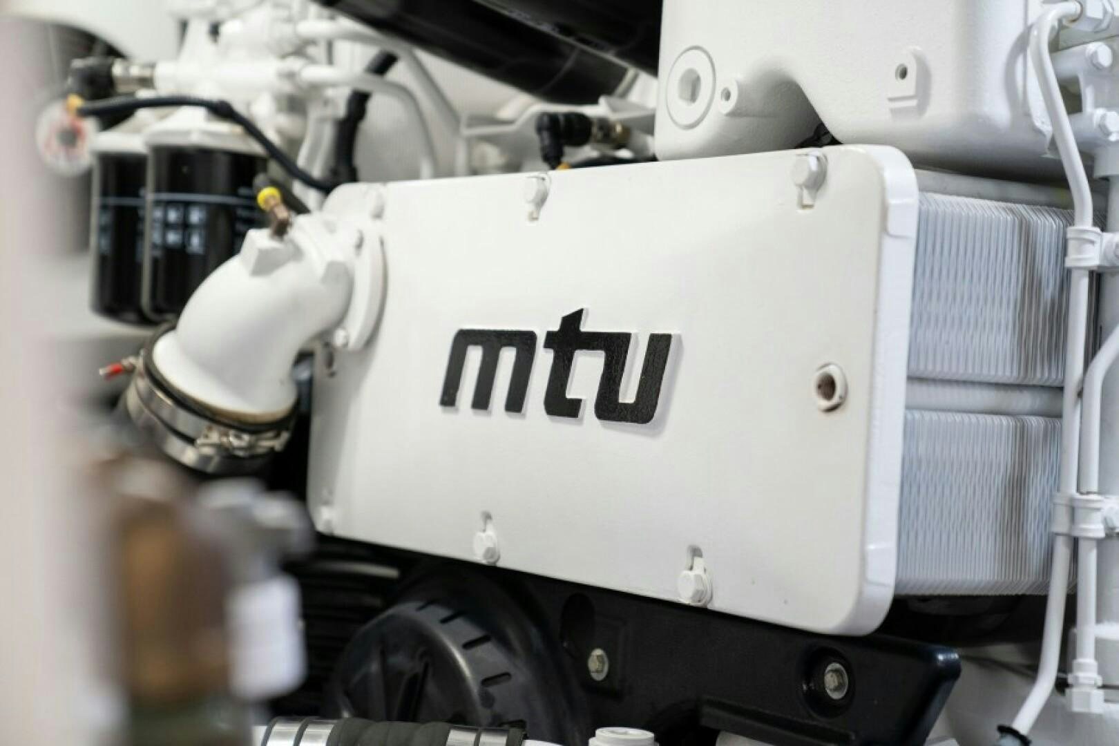 a white machine with a black label aboard WRAPPED UP Yacht for Sale