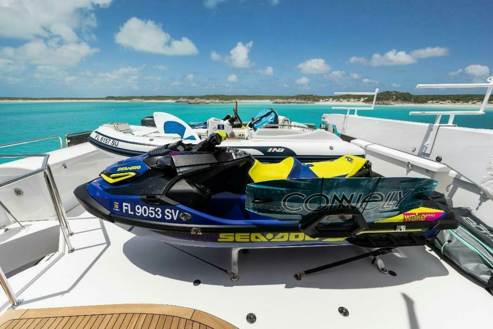 a row of boats on a dock aboard MEMENTO VIVERE Yacht for Sale