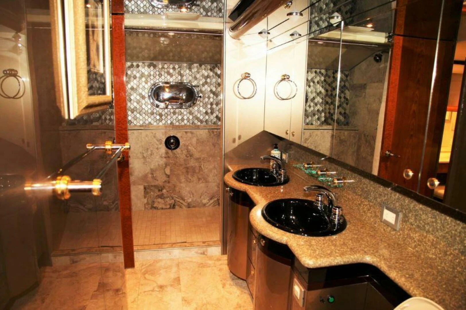 a bathroom with a marble counter top aboard CHASER - BEING OFFERED ON A 50% PARTNERSHIP BASIS Yacht for Sale