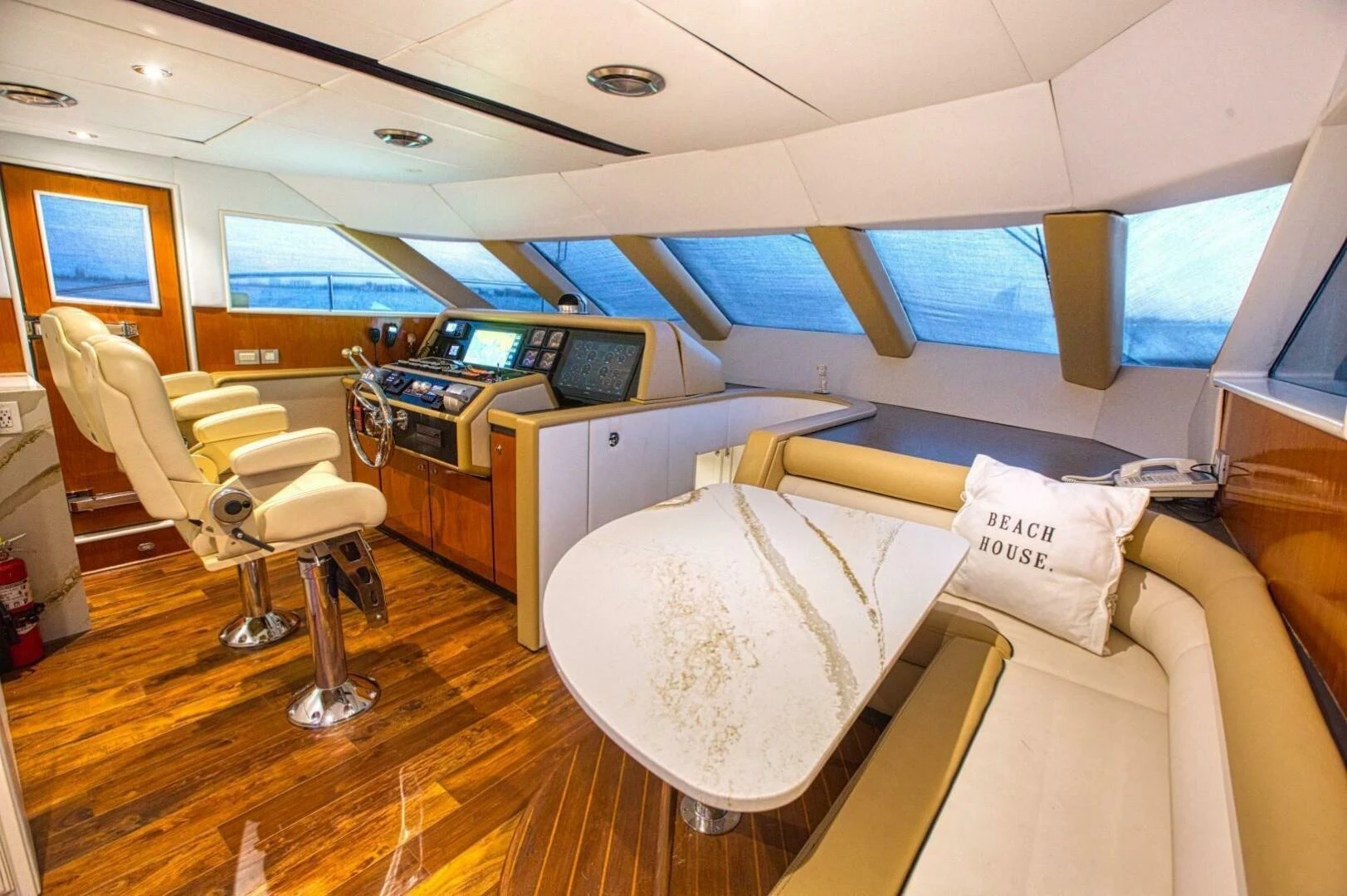 a room with a bed and desk aboard CHASER - BEING OFFERED ON A 50% PARTNERSHIP BASIS Yacht for Sale